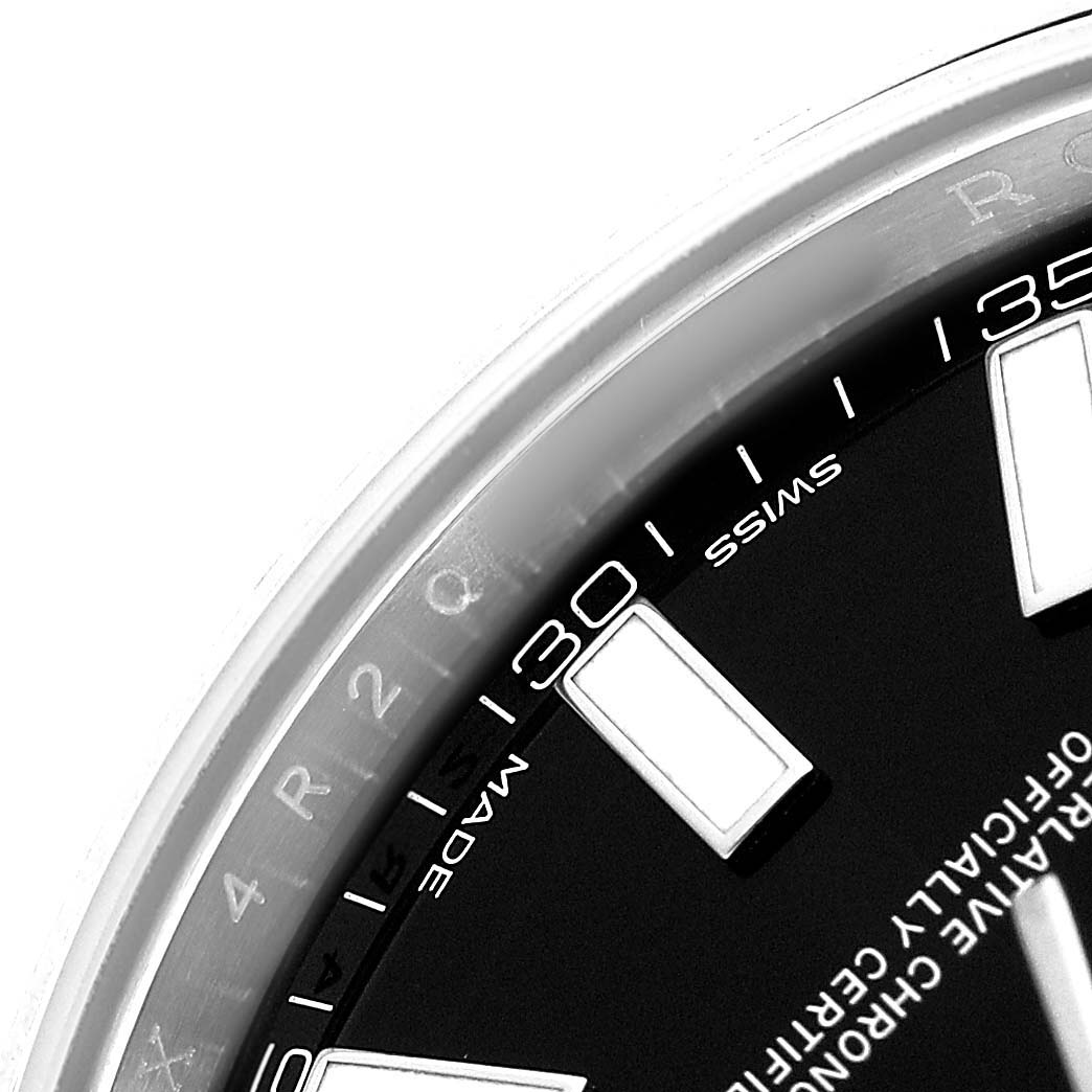 The image shows a close-up of the dial and bezel of the Rolex Datejust 41 116300 Men's Stainless Steel Black Dial, focusing on the hour markers and minute indices.
