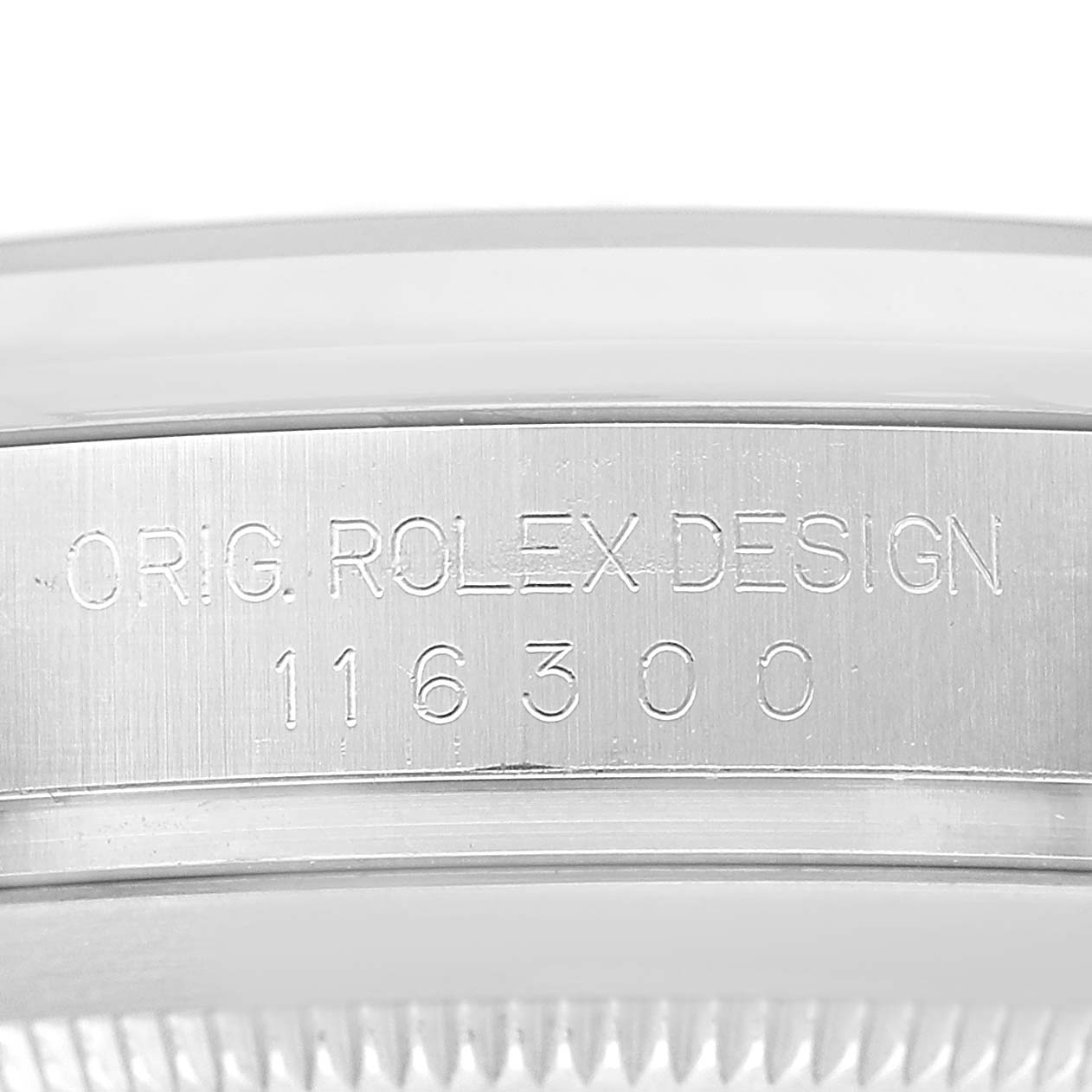 The image shows an engraved side view of the case of a Rolex Datejust 41 116300 Men's Stainless Steel Black Dial, focusing on the serial number and branding.