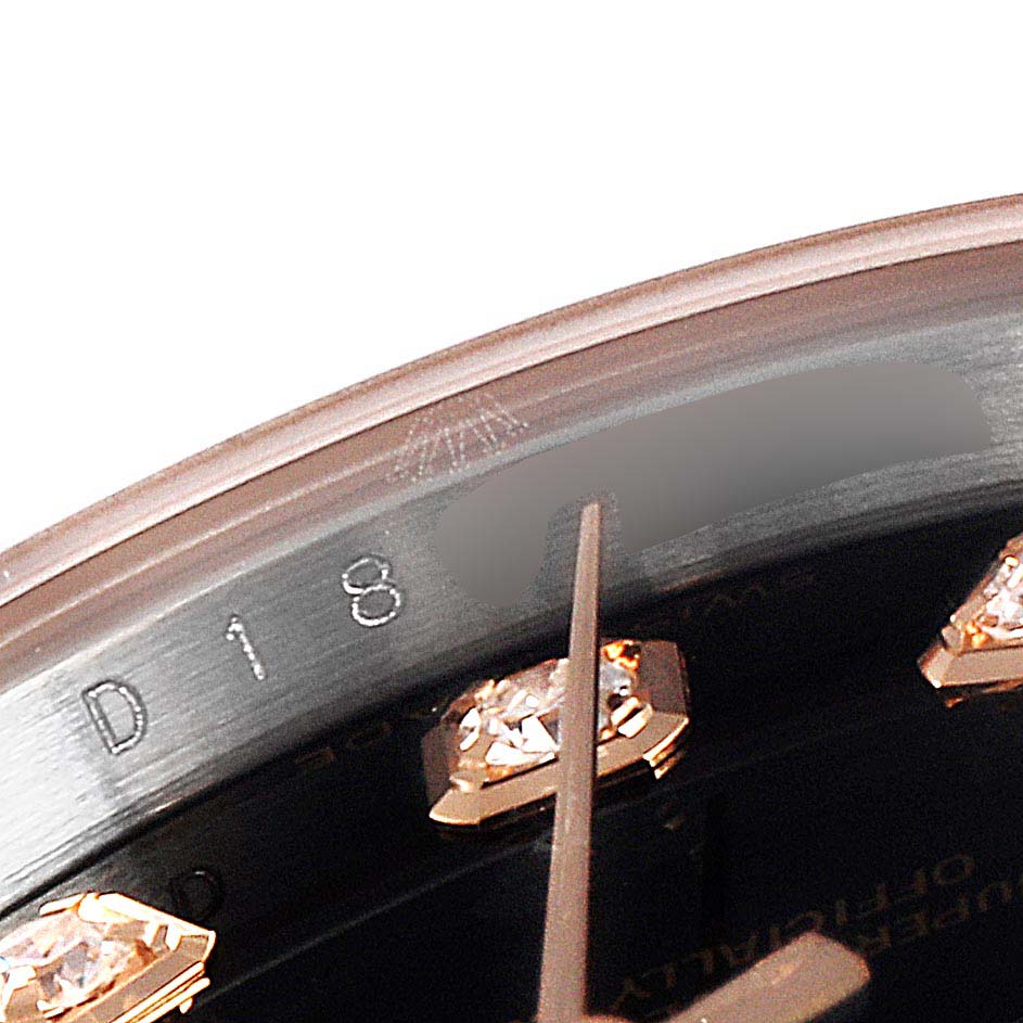 The image shows a close-up of the bezel and part of the dial with diamond hour markers of the Rolex Datejust 179171 Women's Steel and Gold (two tone) Black Dial 179171 Women's Steel and Gold (two tone) Black Dial watch.