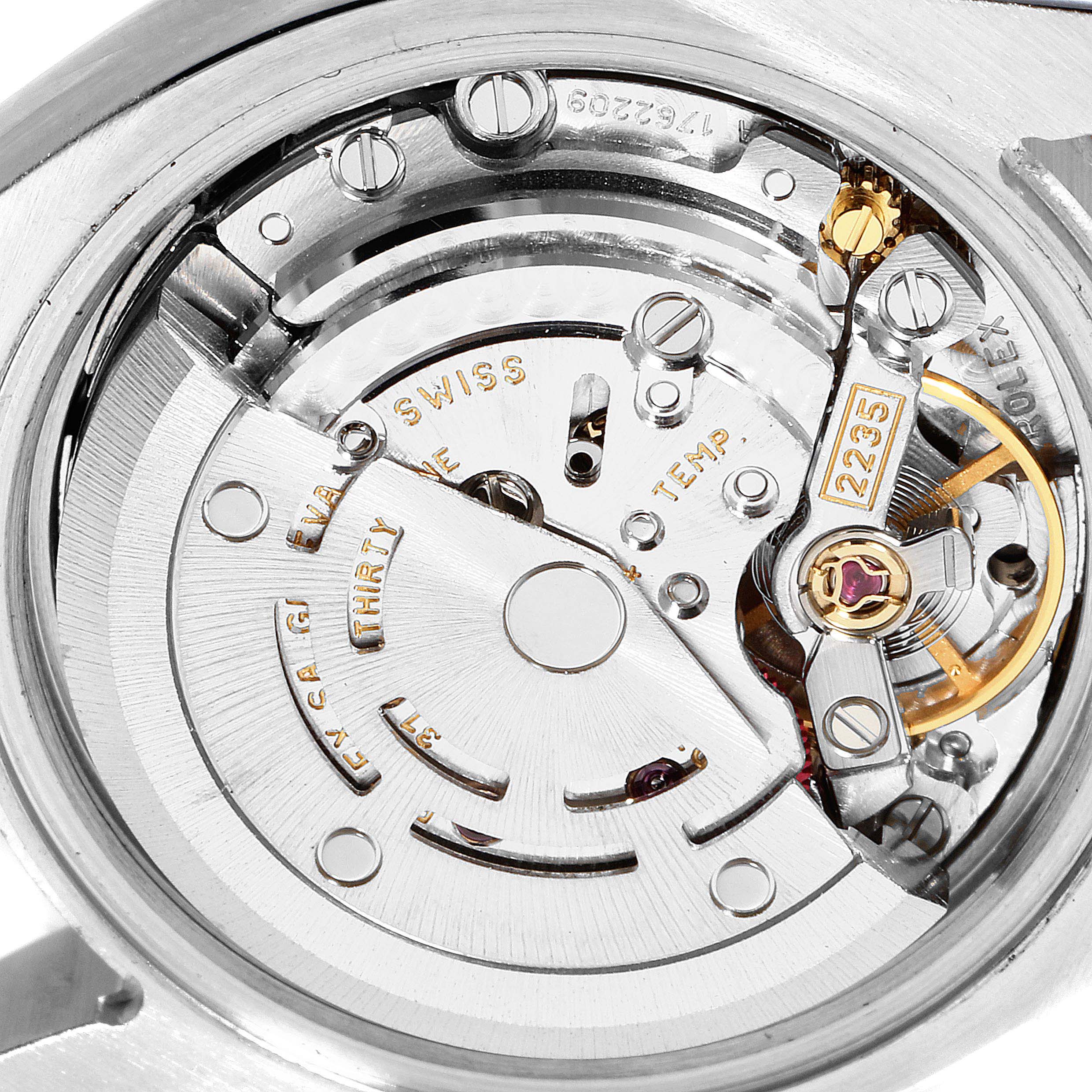 This image shows a close-up view of the internal mechanical movement of a Rolex Datejust 179171 Women's Steel and Gold (two tone) Black Dial 179171 Women's Steel and Gold (two tone) Black Dial watch.