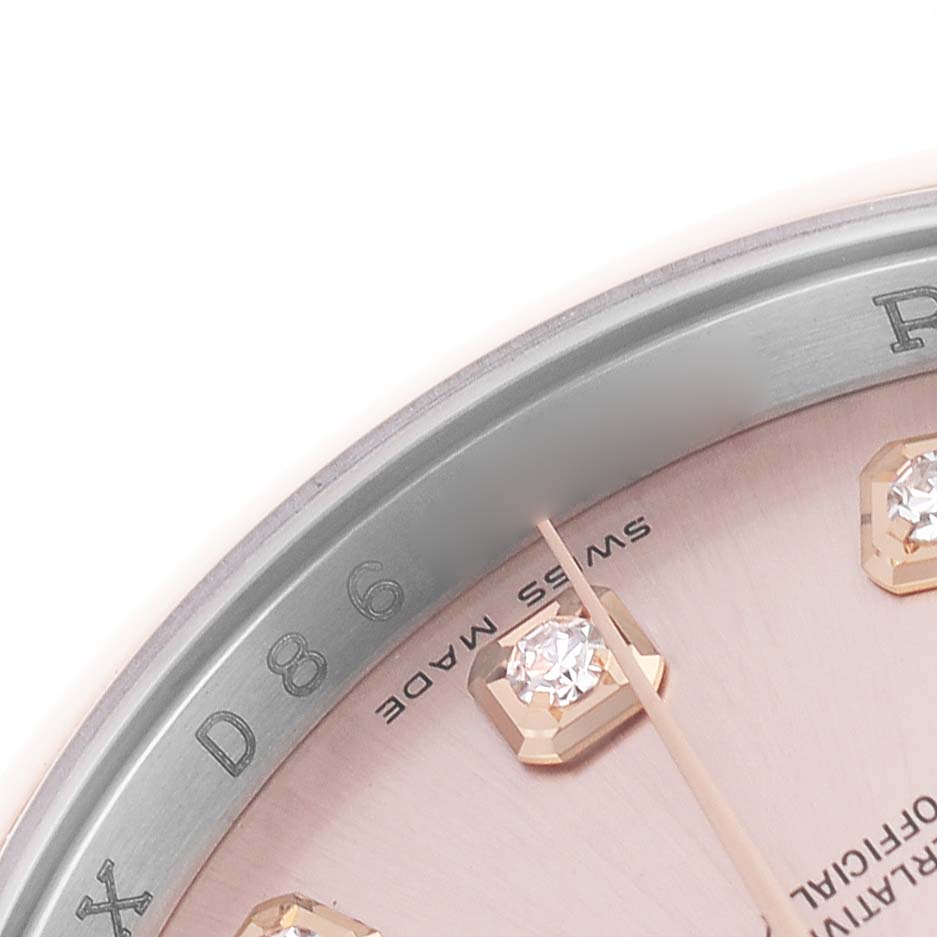 The image shows a close-up of the Rolex Datejust 116201 Women's Stainless Steel Pink Dial watch face with diamond hour markers and part of the bezel.