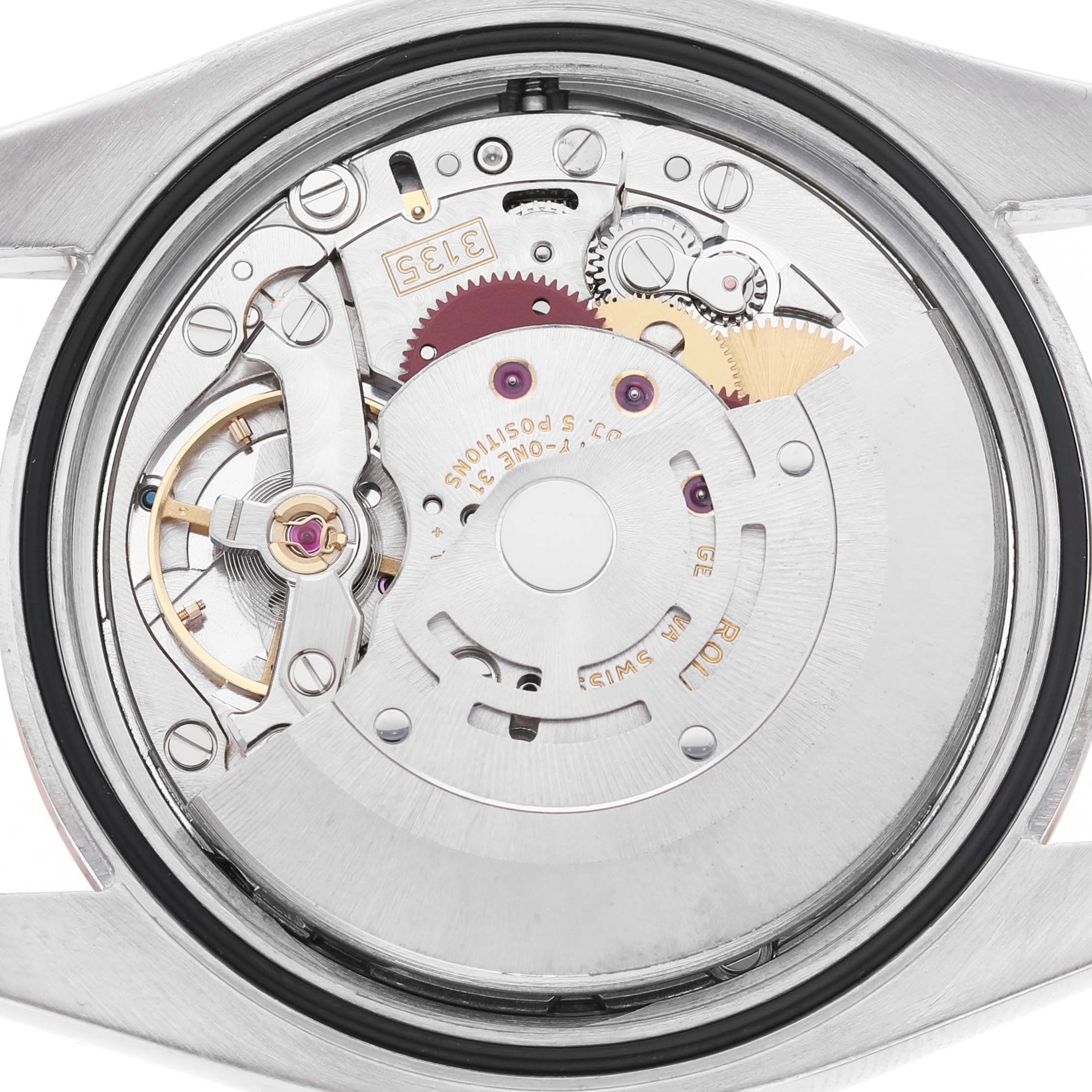 The image shows the movement of a Rolex Datejust 116201 Women's Stainless Steel Pink Dial, showcasing the intricate mechanical parts and rotor from the back.