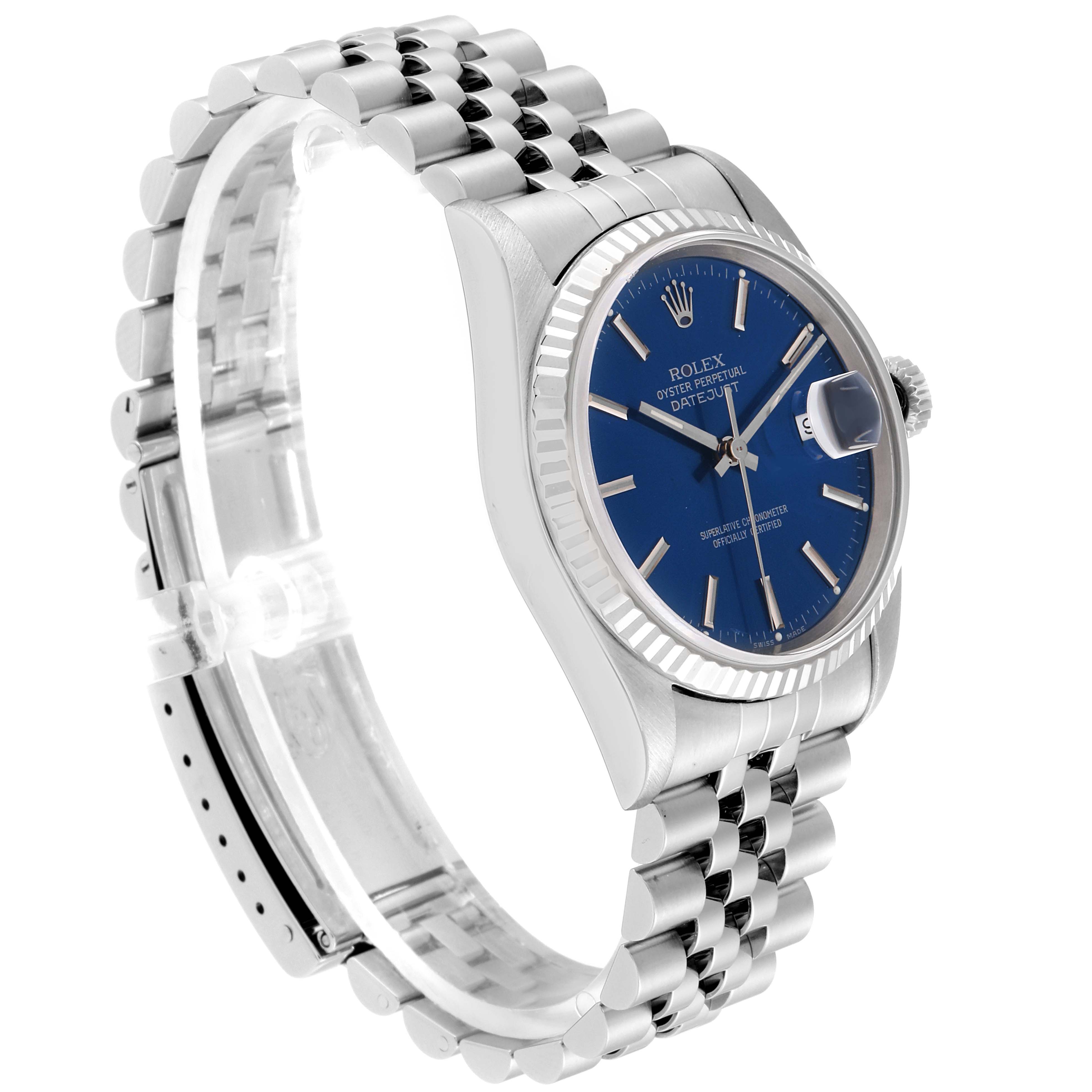 The image shows a Rolex Datejust 16234 Men's Stainless Steel Blue Dial 16234 Men's Stainless Steel Blue Dial watch at a three-quarter angle, highlighting its blue dial, fluted bezel, and jubilee bracelet.
