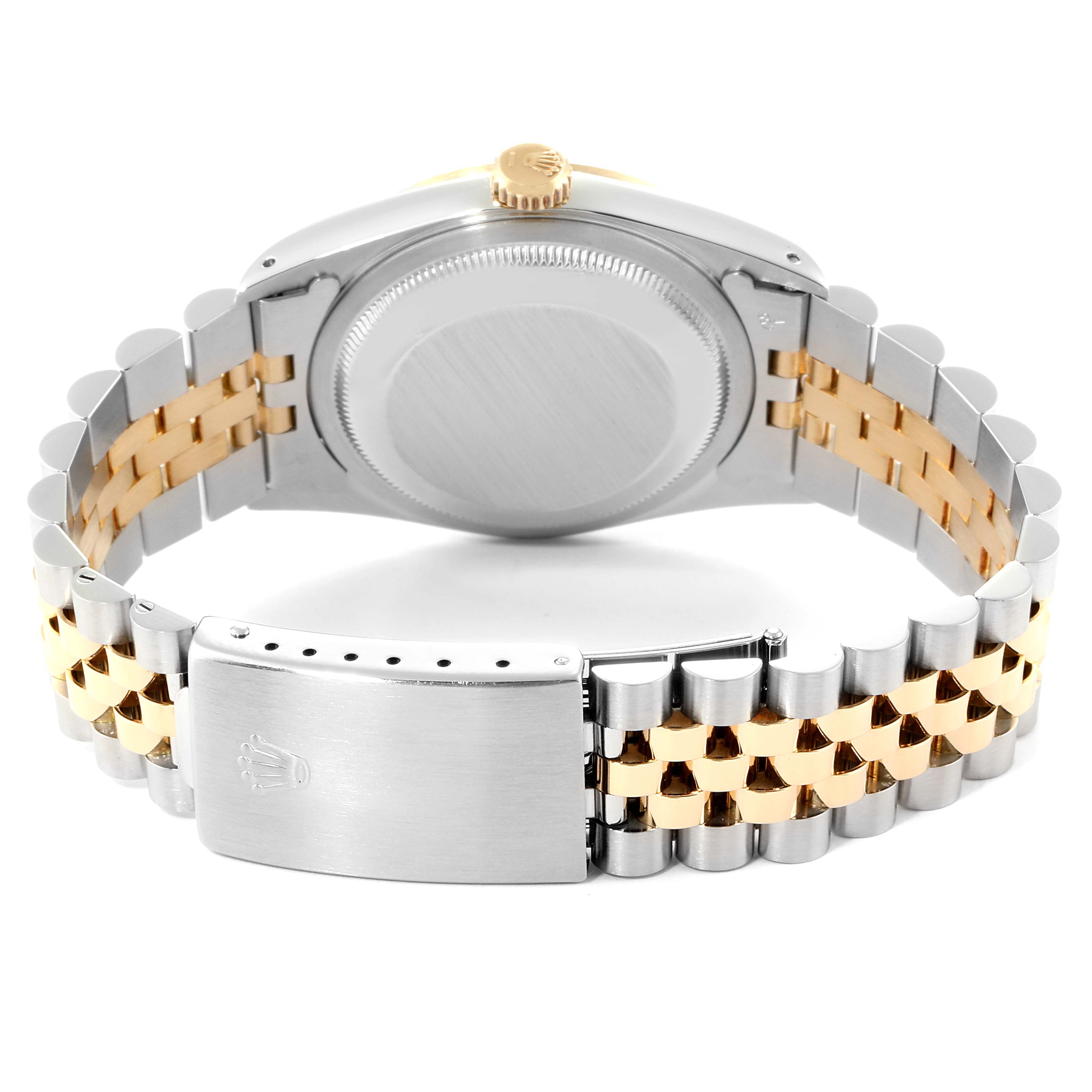 The image shows the back view of a Rolex Datejust 16233 Men's Steel and Gold (two tone) Black Dial 16233 Men's Steel and Gold (two tone) Black Dial watch, highlighting the case, crown, and the two-tone metal bracelet with clasp.