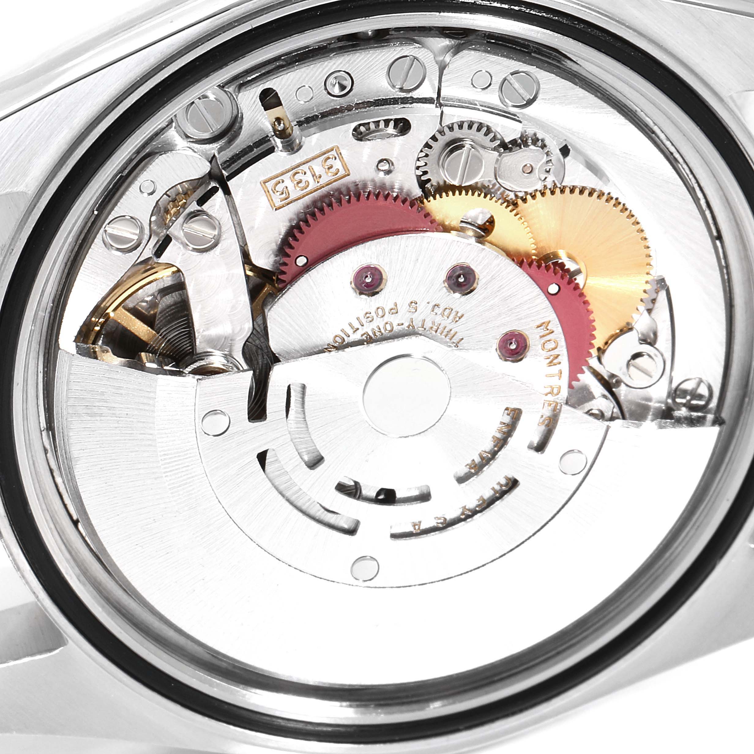 This image shows the inner mechanism and movement components of a Rolex Datejust 16233 Men's Steel and Gold (two tone) Black Dial 16233 Men's Steel and Gold (two tone) Black Dial watch from a close-up angle.