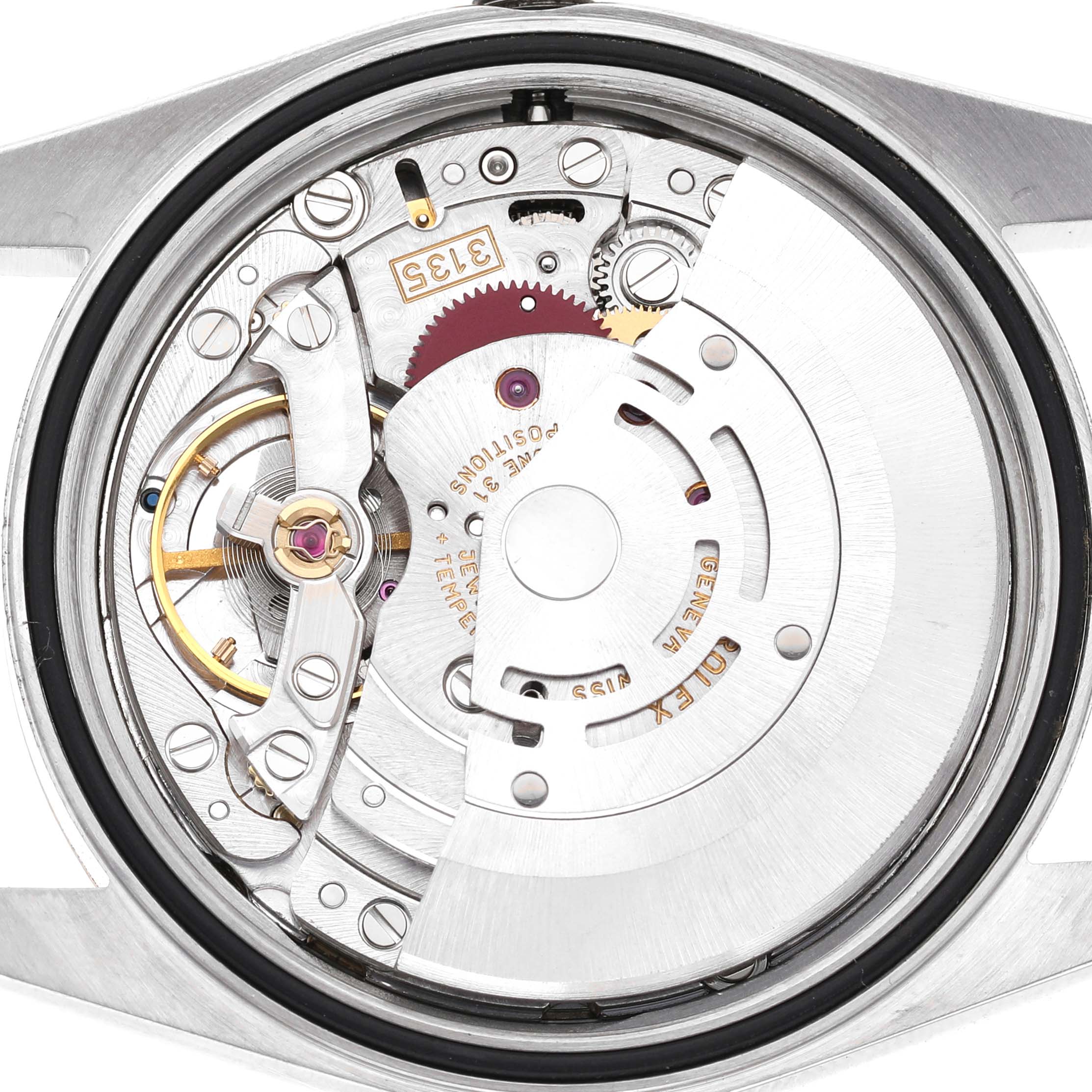 The image shows the movement of a Rolex Datejust 116233 Men's Steel and Gold (two tone) Champagne Dial watch from a rear view, highlighting its intricate mechanical parts.