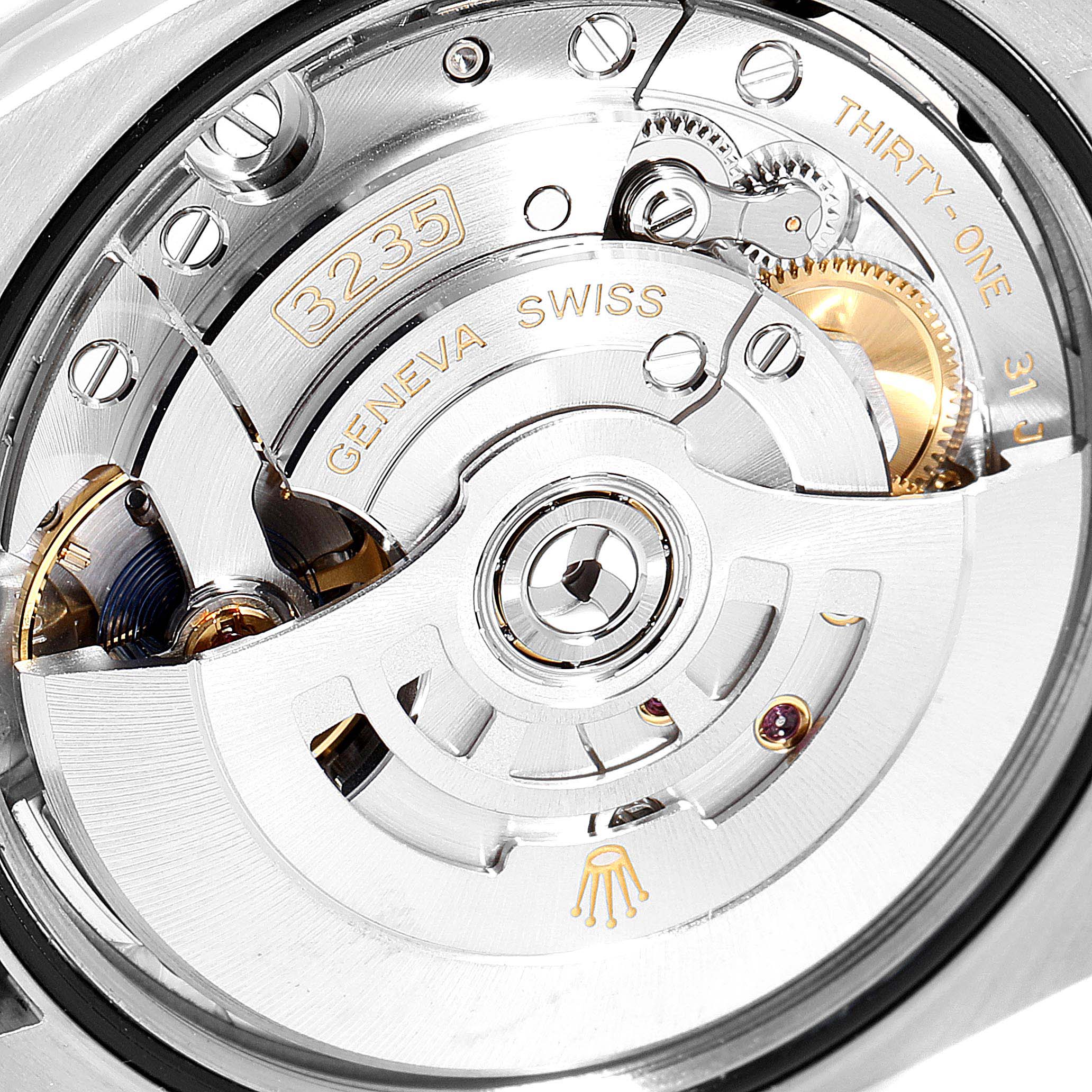 This image shows the detailed internal mechanism of the Rolex Datejust 126233 Men's Steel and Gold (two tone) White Dial 126233 Men's Steel and Gold (two tone) White Dial watch from the back angle.