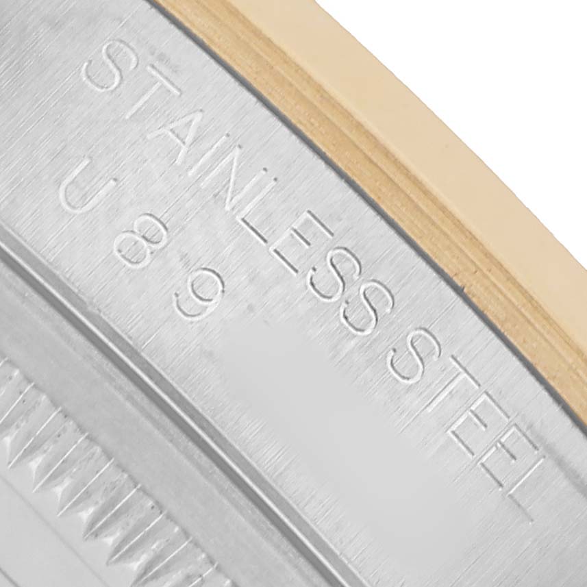 The image shows a close-up of the Rolex Datejust 16203 Men's Stainless Steel Grey Dial's case side, highlighting the stainless steel marking.