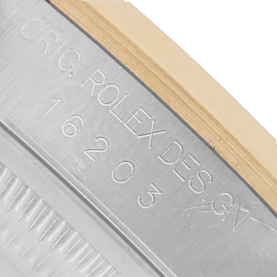 The image shows the side of a Rolex Datejust 16203 Men's Stainless Steel Grey Dial watch, highlighting the engraved case with the model number.