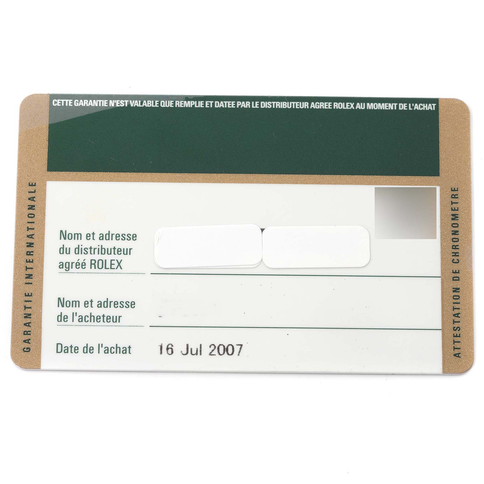 This is a horizontal view of the international warranty card for the Rolex Datejust 16203 Men's Steel and Gold (two tone) Grey Dial 16203 Men's Steel and Gold (two tone) Grey Dial watch.