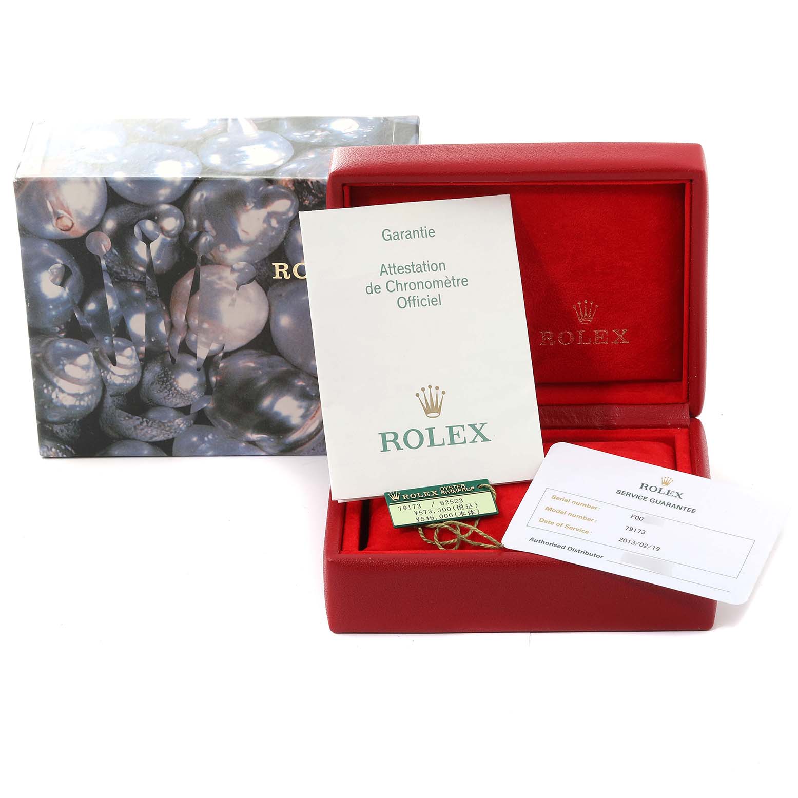 The image shows a Rolex Datejust 79173 Women's Steel and Gold (two tone) White Dial 79173 Women's Steel and Gold (two tone) White Dial watch box, documentation, and warranty cards.