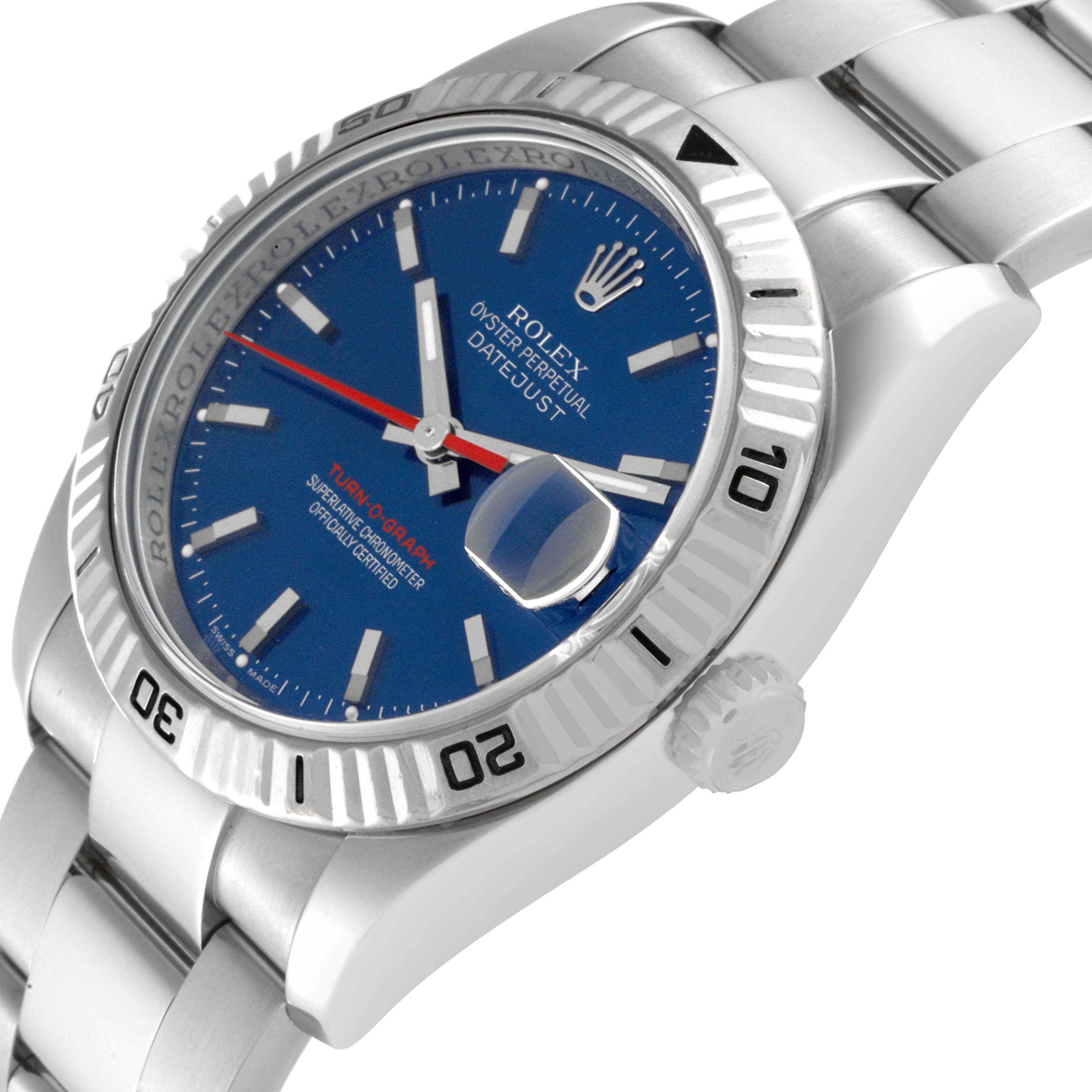 This image shows a close-up of the Rolex Turn-o-Graph 116264 Men
s Stainless Steel Blue Dial 116264 Men
s Stainless Steel Blue Dial watch face and part of the bracelet at a slight angle.