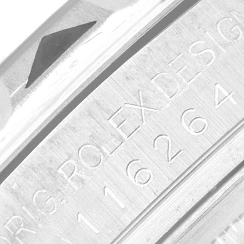 This close-up image shows the engraving on the side of the Rolex Turn-o-Graph 116264 Men
s Stainless Steel Blue Dial 116264 Men
s Stainless Steel Blue Dial watch case.