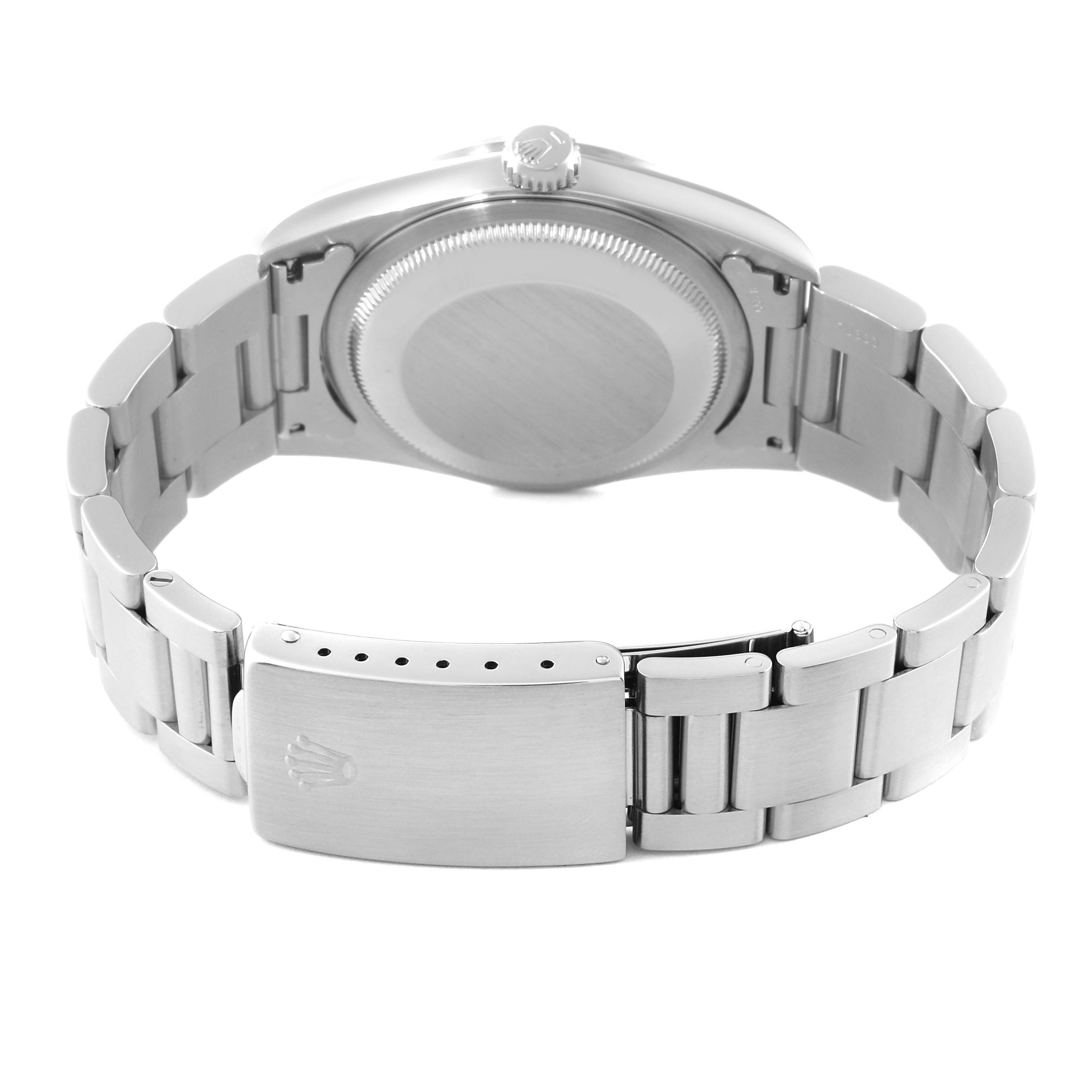 The image shows the back view of a Rolex Datejust 16200 Men's Stainless Steel White Dial 16200 Men's Stainless Steel White Dial watch, highlighting its case back and metal bracelet with clasp.