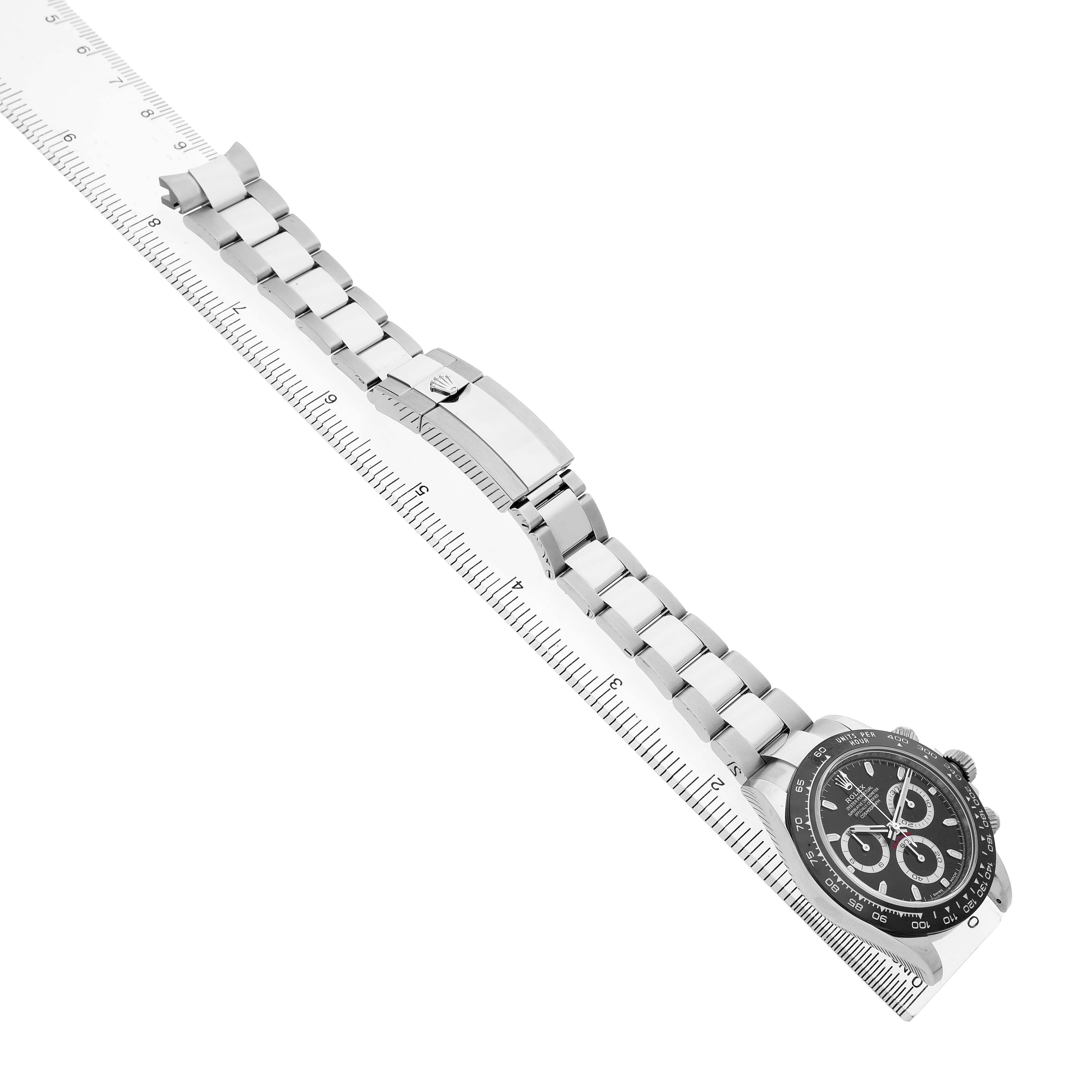 The Rolex Daytona 116500LN Men's Stainless Steel Black Dial watch is shown at an angle displaying the full bracelet, clasp, and dial face.