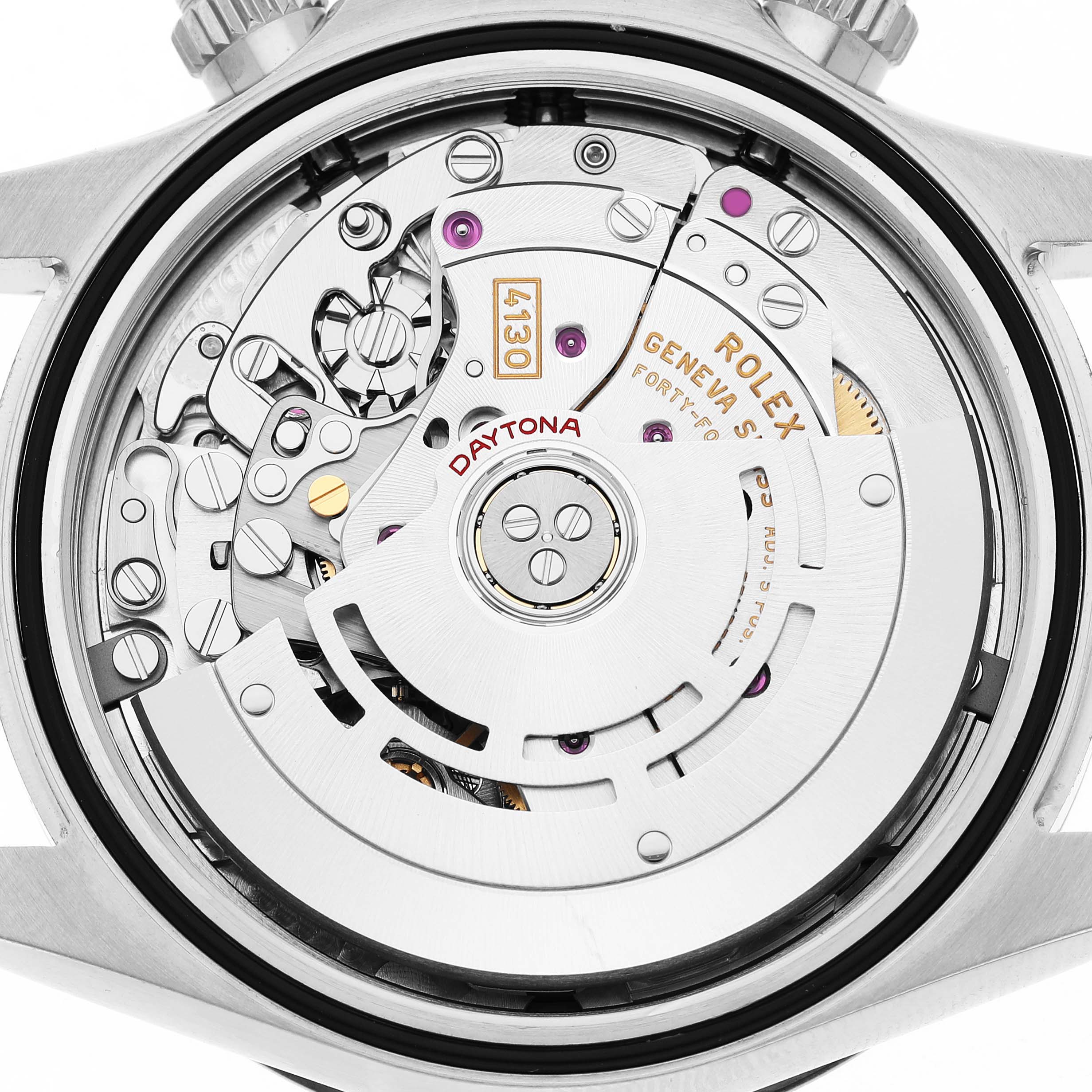 The image shows the intricate movement of a Rolex Daytona 116500LN Men's Stainless Steel Black Dial watch from a rear view.