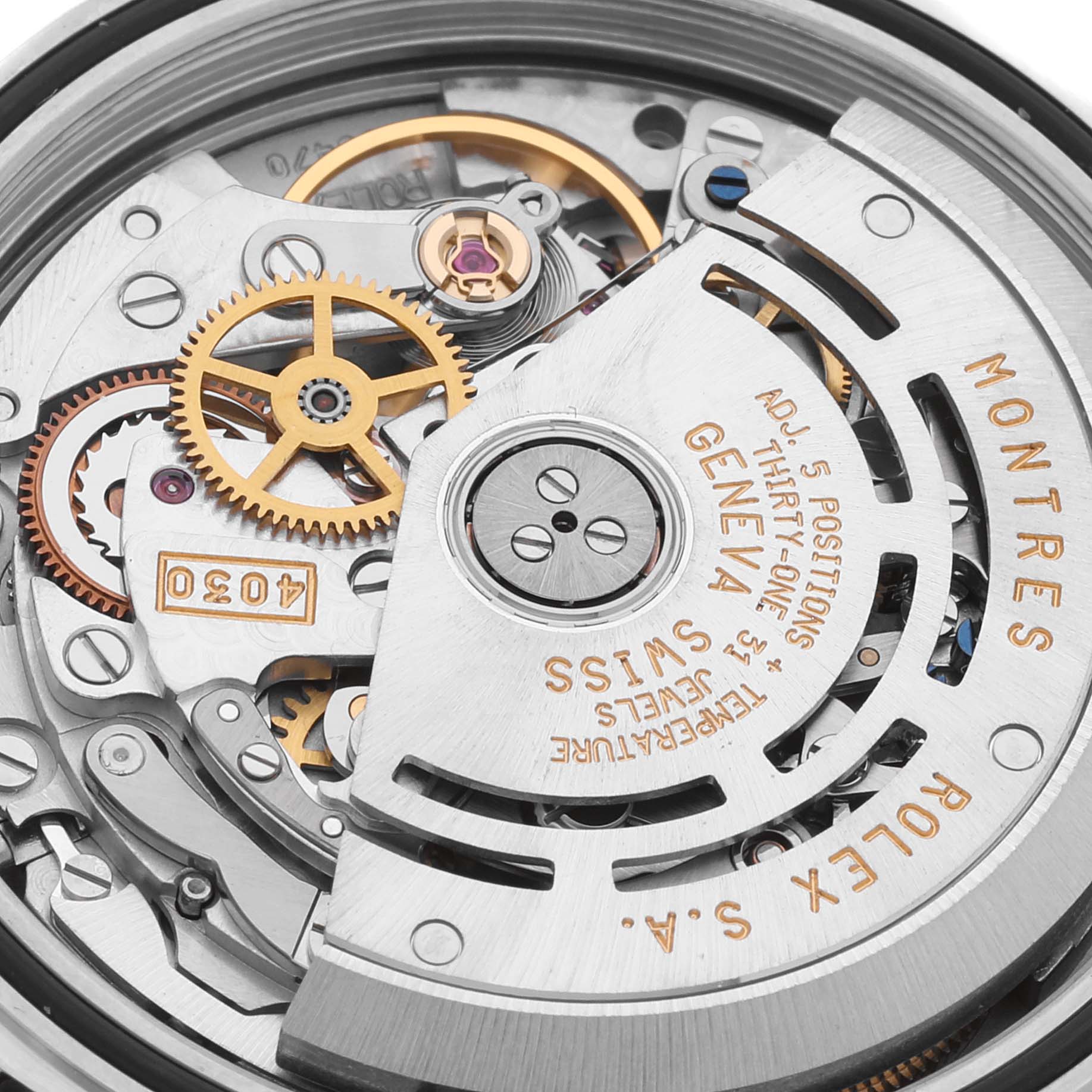 This image shows the intricate internal movement and mechanism of a Rolex Daytona 16523 Men
s Steel and Gold (two tone) White Dial 16523 Men
s Steel and Gold (two tone) White Dial watch.