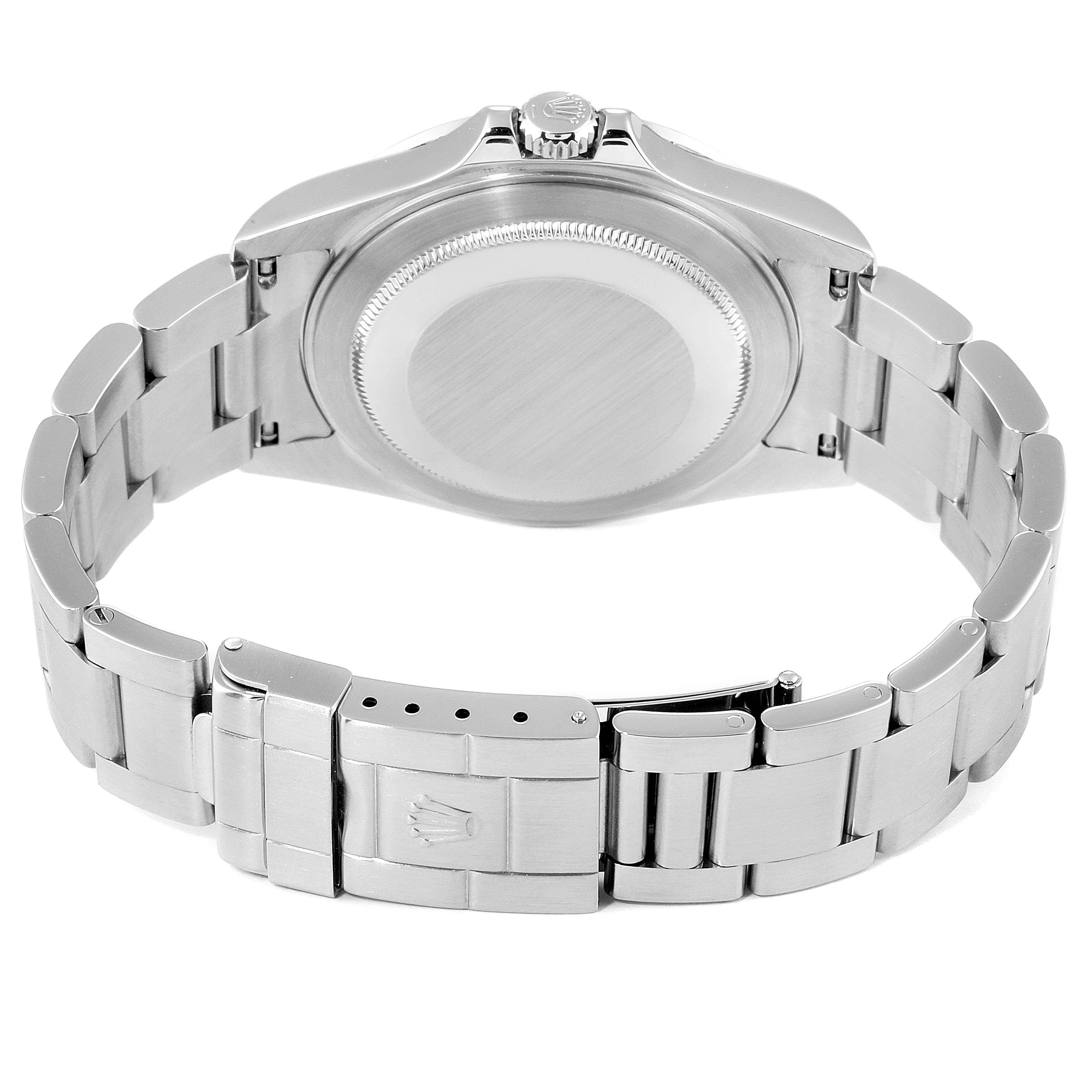 This image shows the back case and bracelet of a Rolex Explorer 16570 Men
s Stainless Steel Black Dial 16570 Men
s Stainless Steel Black Dial watch, including the clasp and crown from a rear angle.