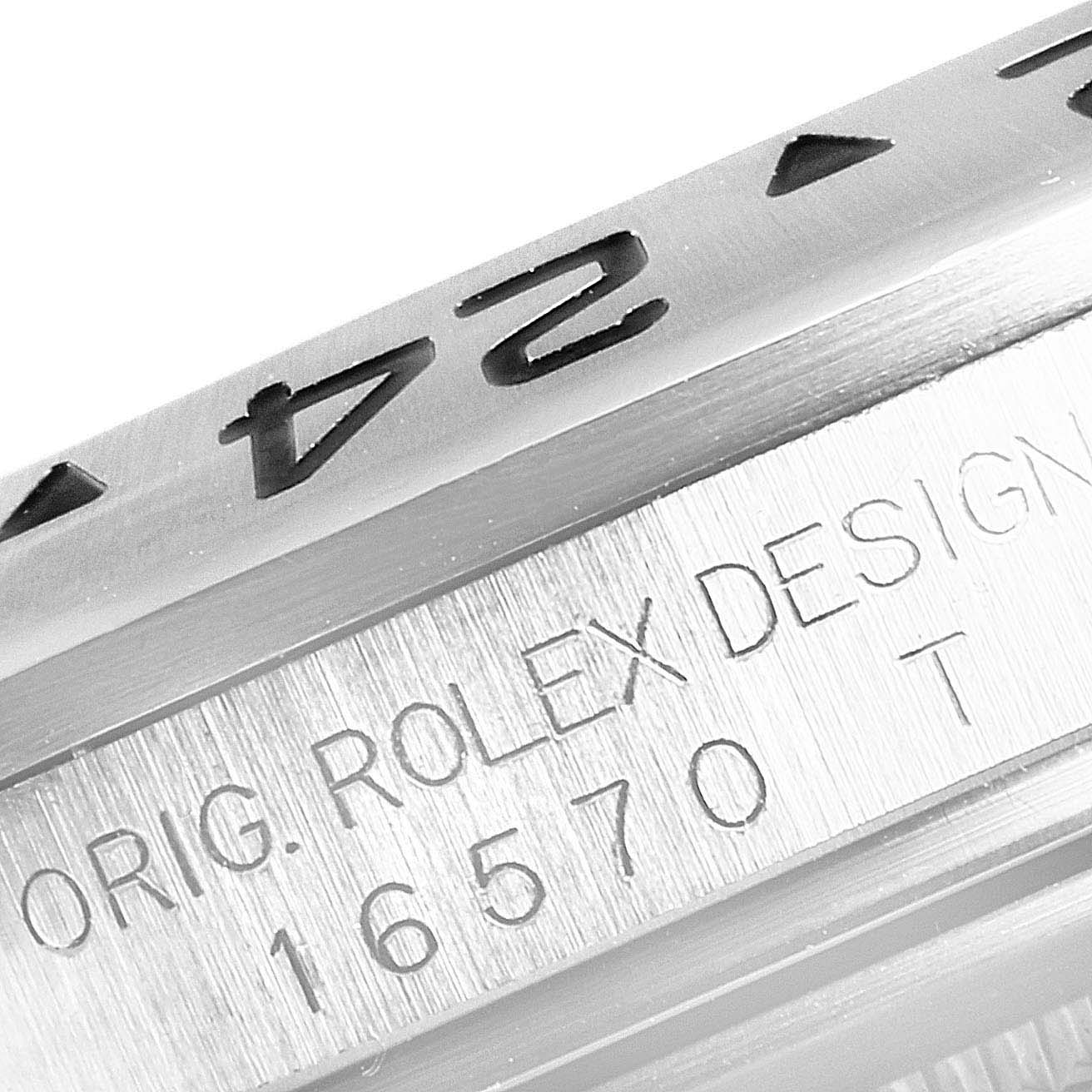 This image shows a close-up of the bezel and case side of a Rolex Explorer 16570 Men
s Stainless Steel Black Dial 16570 Men
s Stainless Steel Black Dial watch, showcasing the model number "16570".