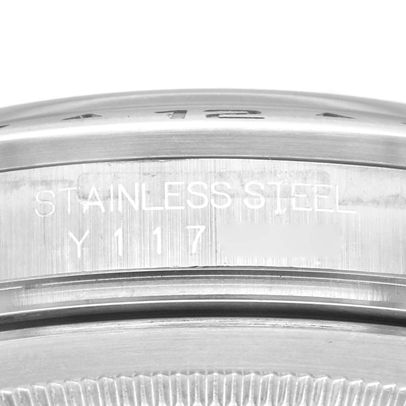 This image shows a close-up view of the case back and serial number of a Rolex Explorer 16570 Men's Stainless Steel Black Dial 16570 Men's Stainless Steel Black Dial watch in stainless steel.