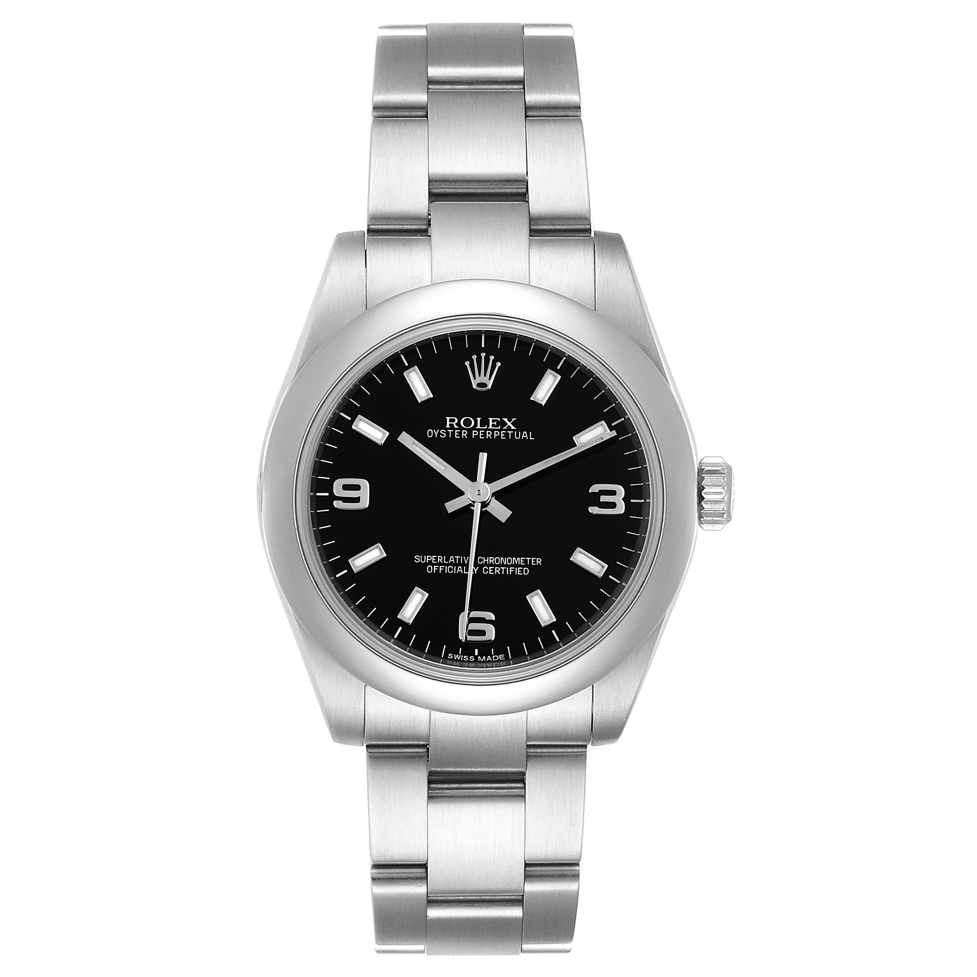 The Rolex Mid-Size 177200 Women
s Stainless Steel Black Dial 177200 Women
s Stainless Steel Black Dial Oyster Perpetual watch is shown from a front view, displaying its black dial, silver case, and bracelet.