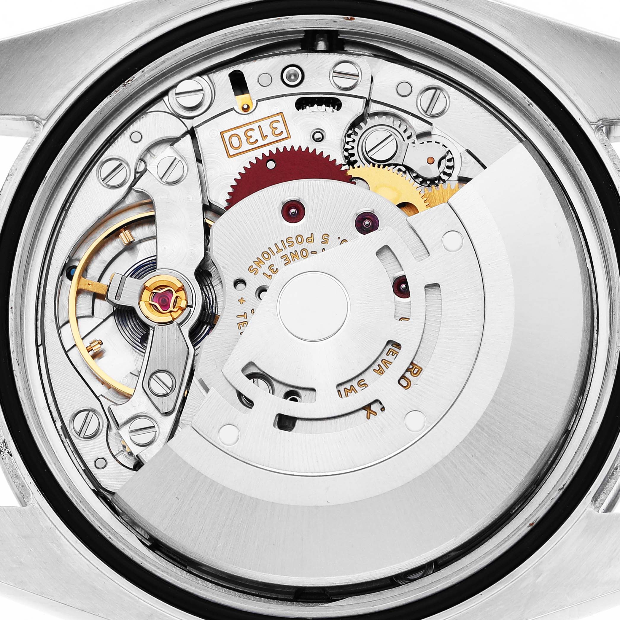 The image shows the movement of a Rolex Oyster Perpetual 116000 Men's Stainless Steel Silver Dial watch from a top-down angle, highlighting gears and the rotor.