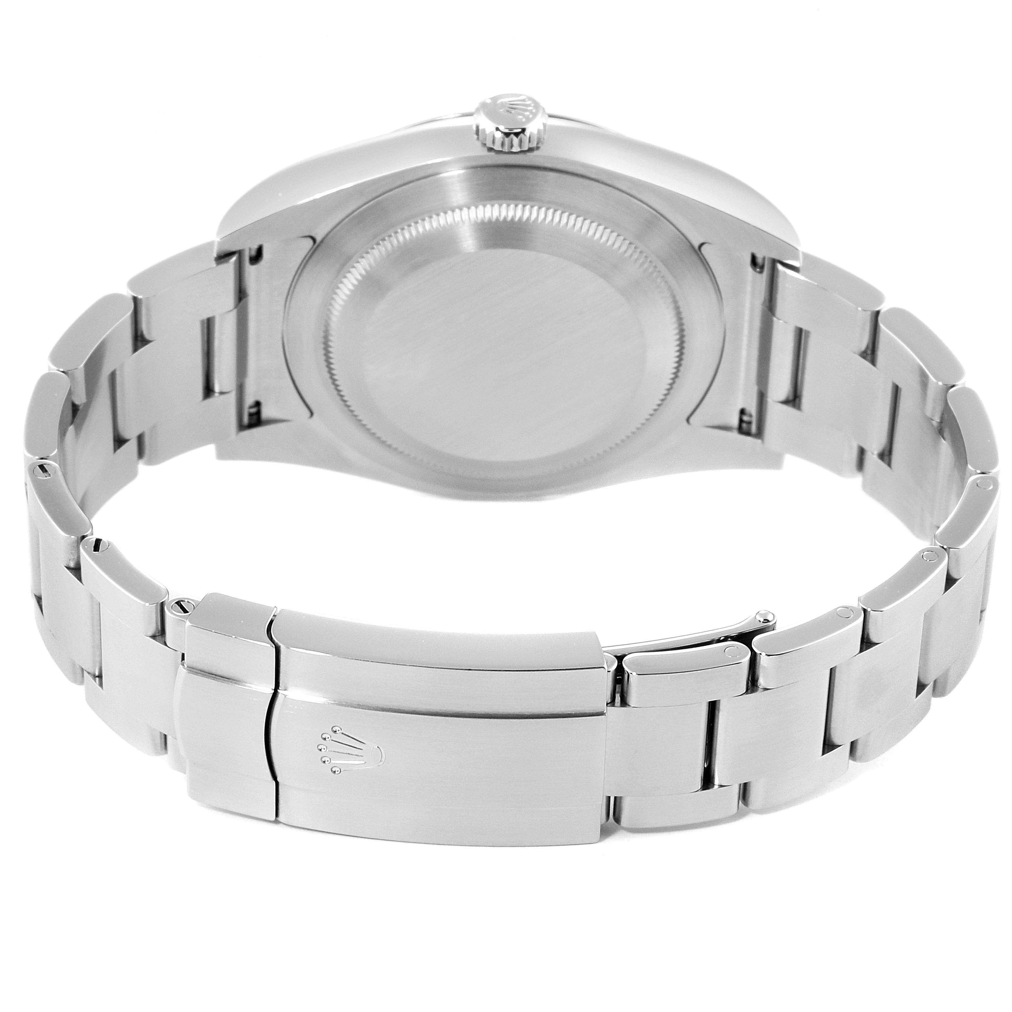 The image shows the back case and bracelet clasp of a Rolex Oyster Perpetual 114300 Men's Stainless Steel Black Dial 114300 Men's Stainless Steel Black Dial watch.