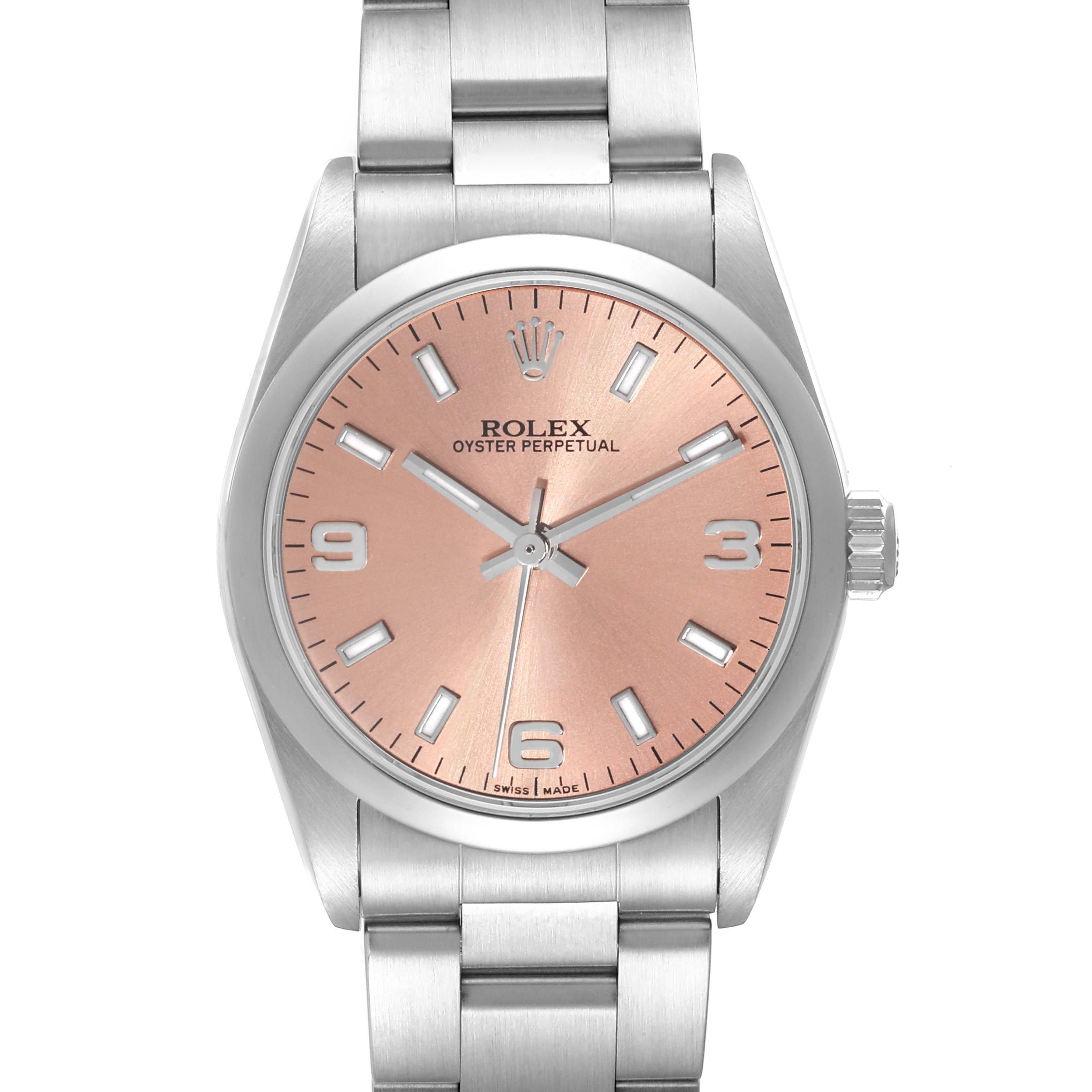 This image shows a front view of a Mid-Size Rolex Oyster Perpetual watch, featuring a pink face and stainless steel bracelet.