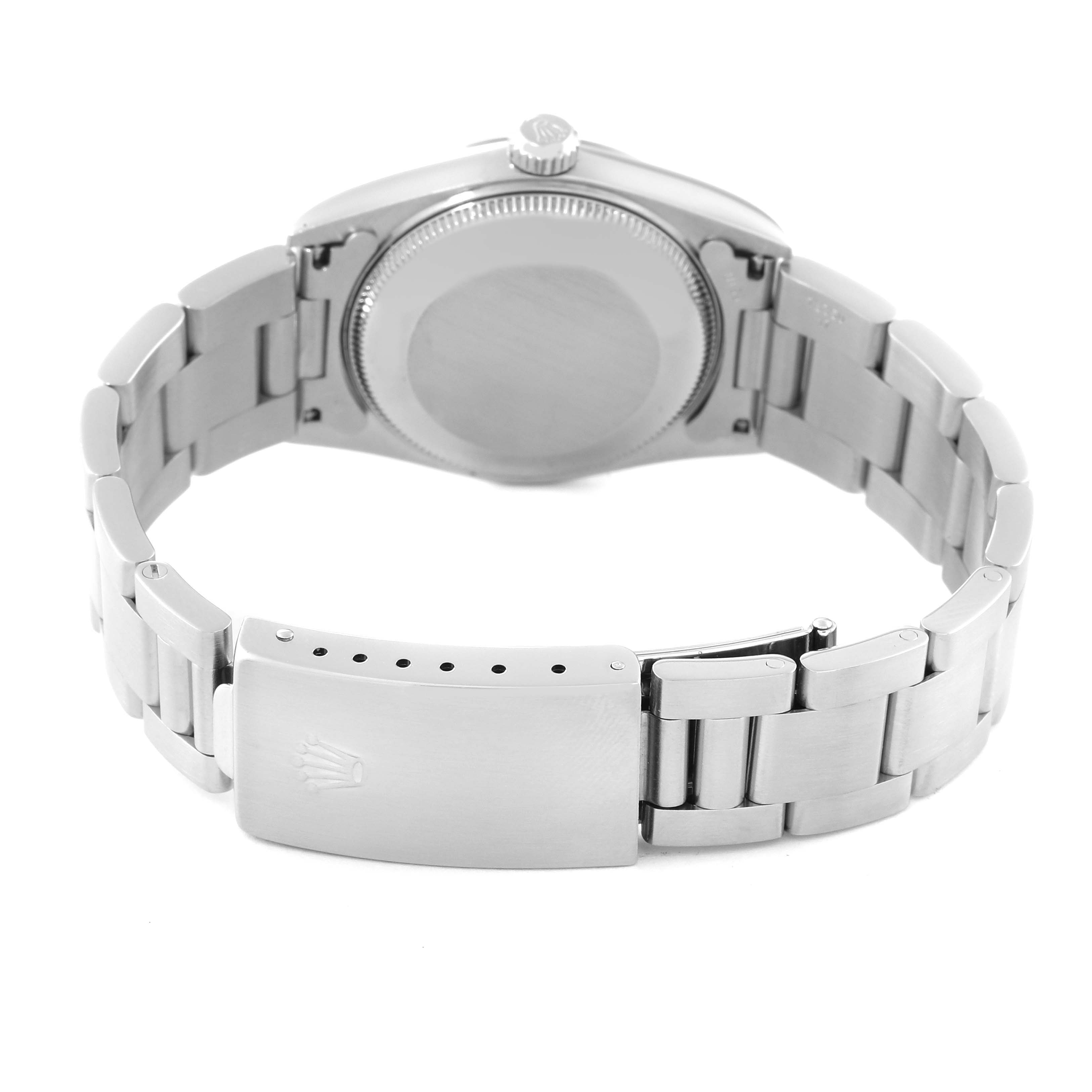 This image shows the back of the case and clasp of a Mid-Size Rolex watch from a rear angle.