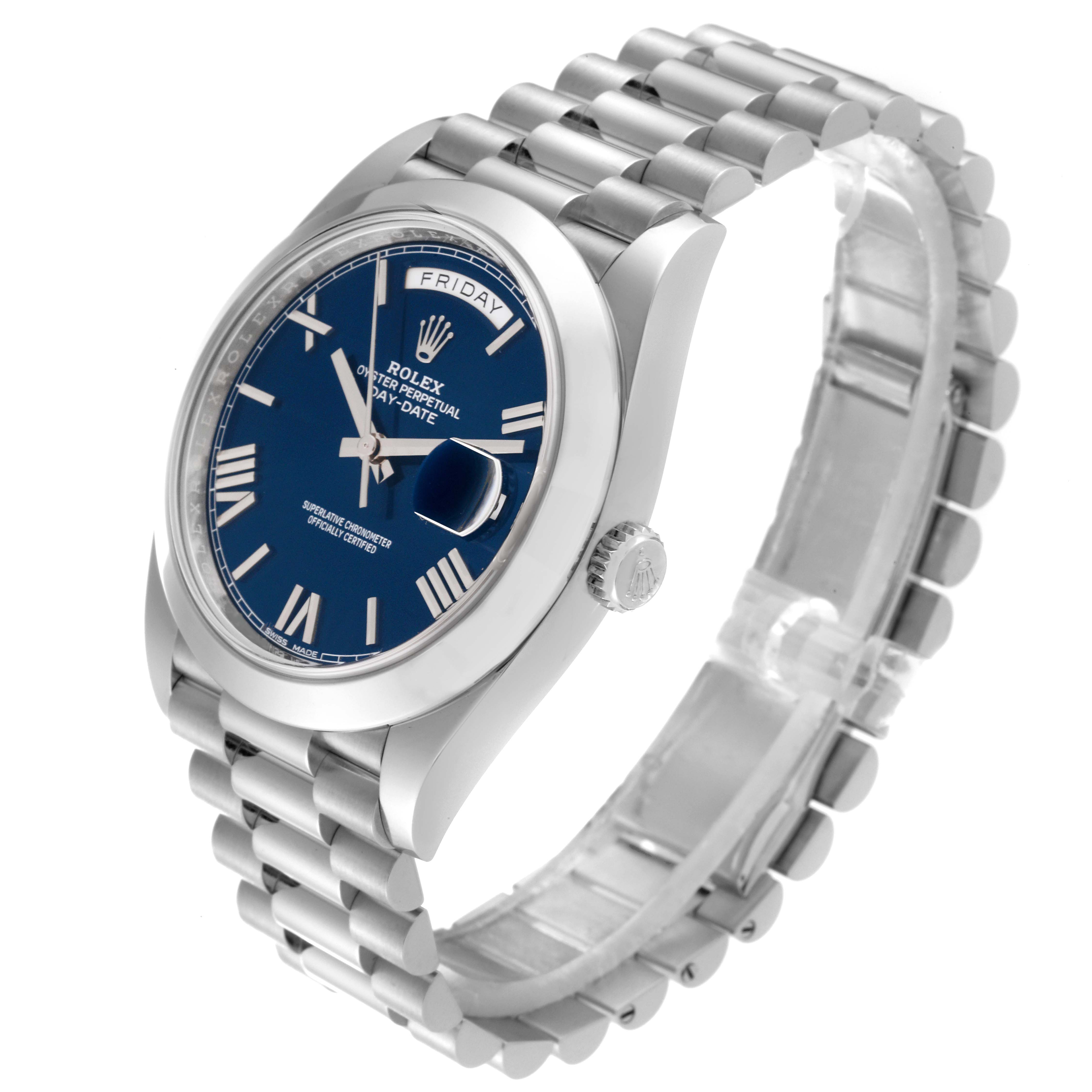 This image shows a side front angle of a Rolex President 228206 Men
s Platinum Blue Dial 228206 Men
s Platinum Blue Dial model watch, revealing its face, bracelet, and crown.