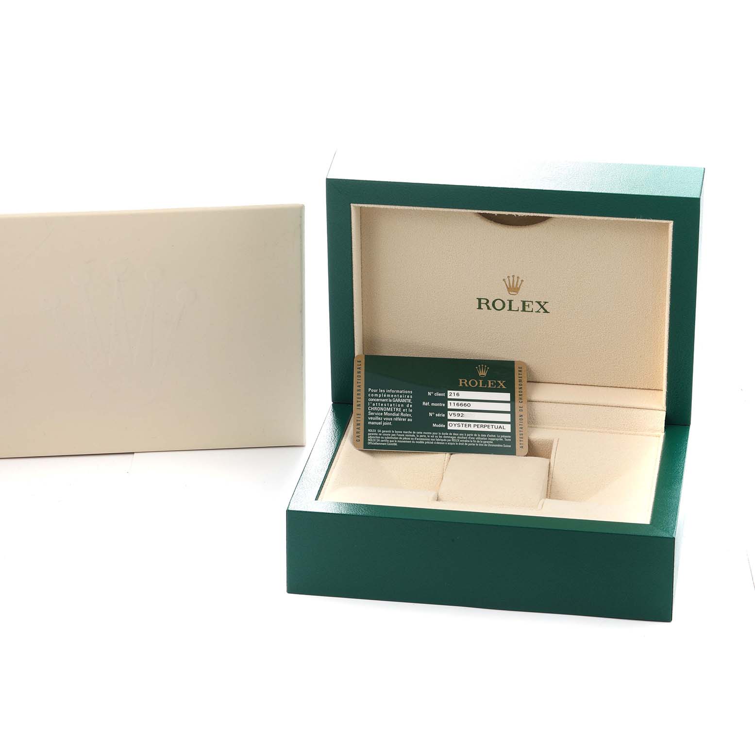 The image shows an open Rolex Sea-Dweller 116660 Men
s Stainless Steel Black Dial box with a warranty card inside.