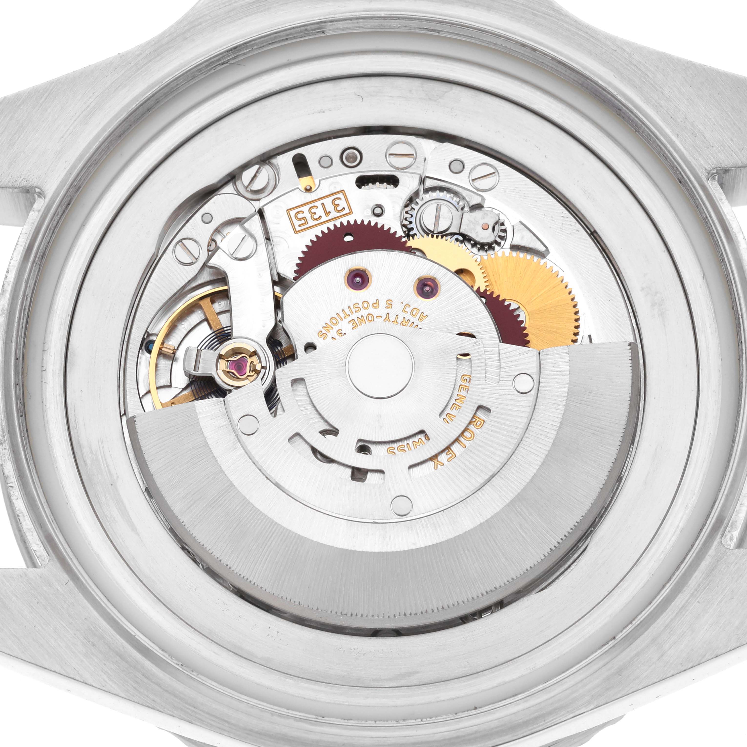 The image shows the back view of a Rolex Sea-Dweller 116660 Men
s Stainless Steel Black Dial, revealing its mechanical movement and intricate components.