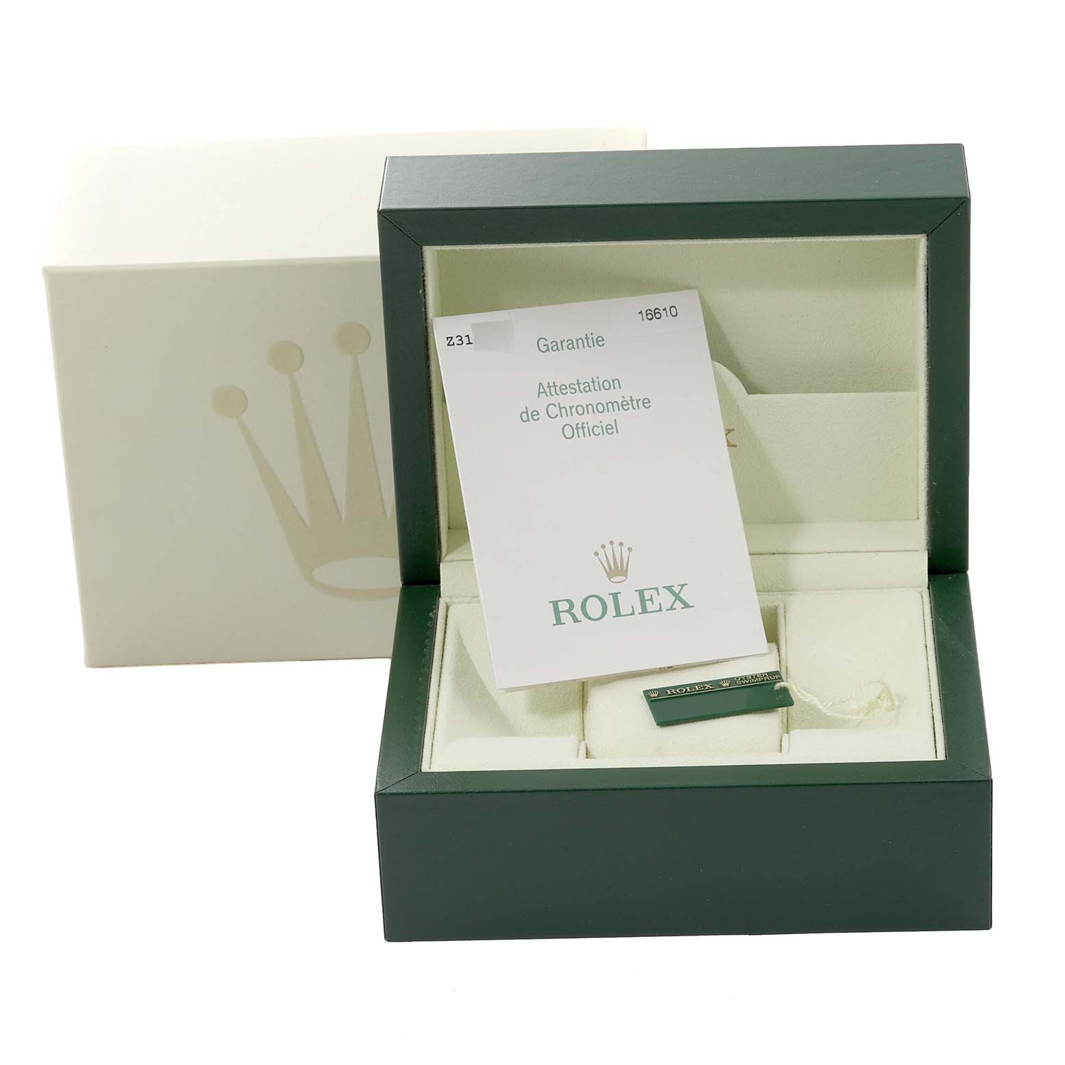 The image shows the open box for a Rolex Submariner 16610 Men's Stainless Steel Black Dial 16610 Men's Stainless Steel Black Dial watch, displaying the warranty card and tag accessories.