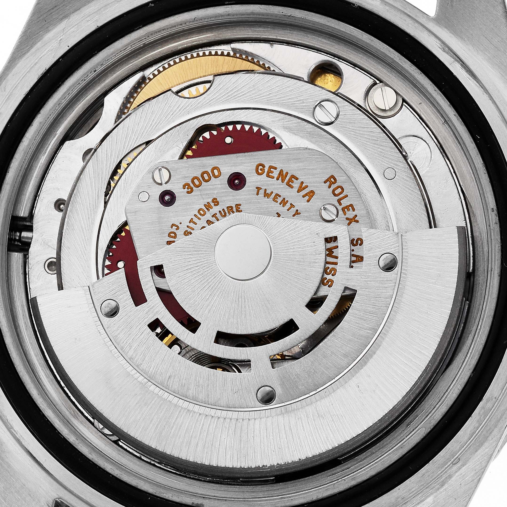 This is a close-up view of the movement inside a Rolex Submariner 14060 Men's Stainless Steel Black Dial 14060 Men's Stainless Steel Black Dial watch, showing the intricate mechanical components.