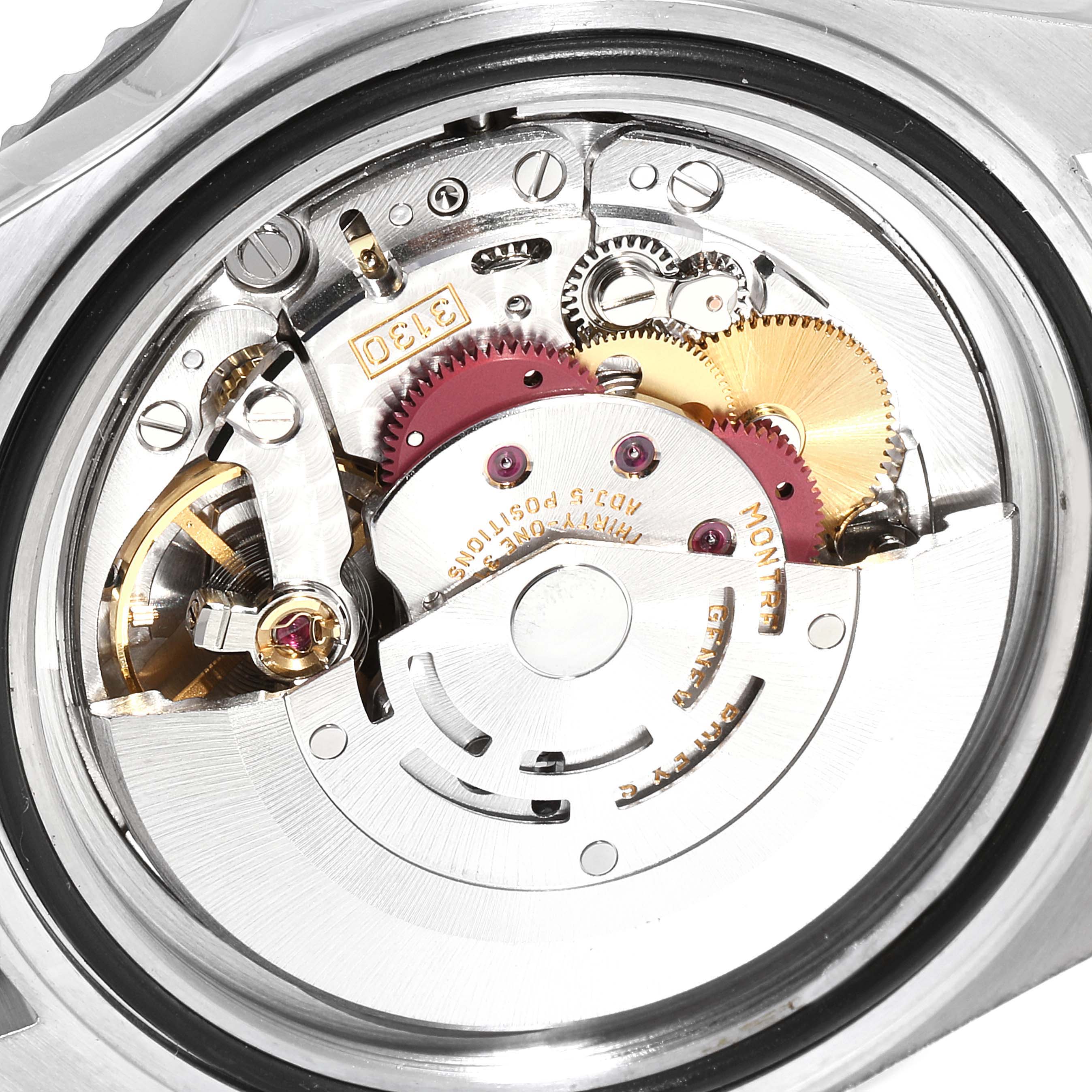 This image shows a close-up view of the movement and internal components of a Rolex Submariner 14060 Men
s Stainless Steel Black Dial 14060 Men
s Stainless Steel Black Dial watch.