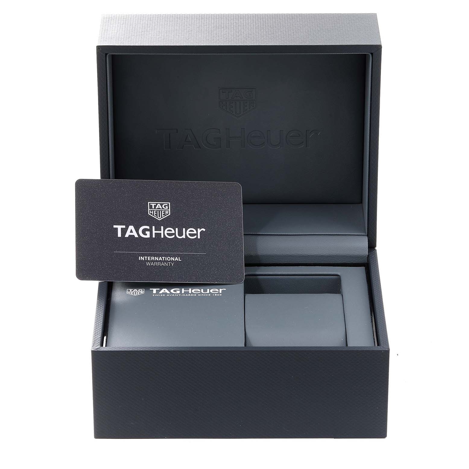 The image shows an open Tag Heuer Carrera CV2A1R.BA0799 Men's Stainless Steel Black Dial CV2A1R.BA0799 Men's Stainless Steel Black Dial watch box and international warranty card from a frontal angle.