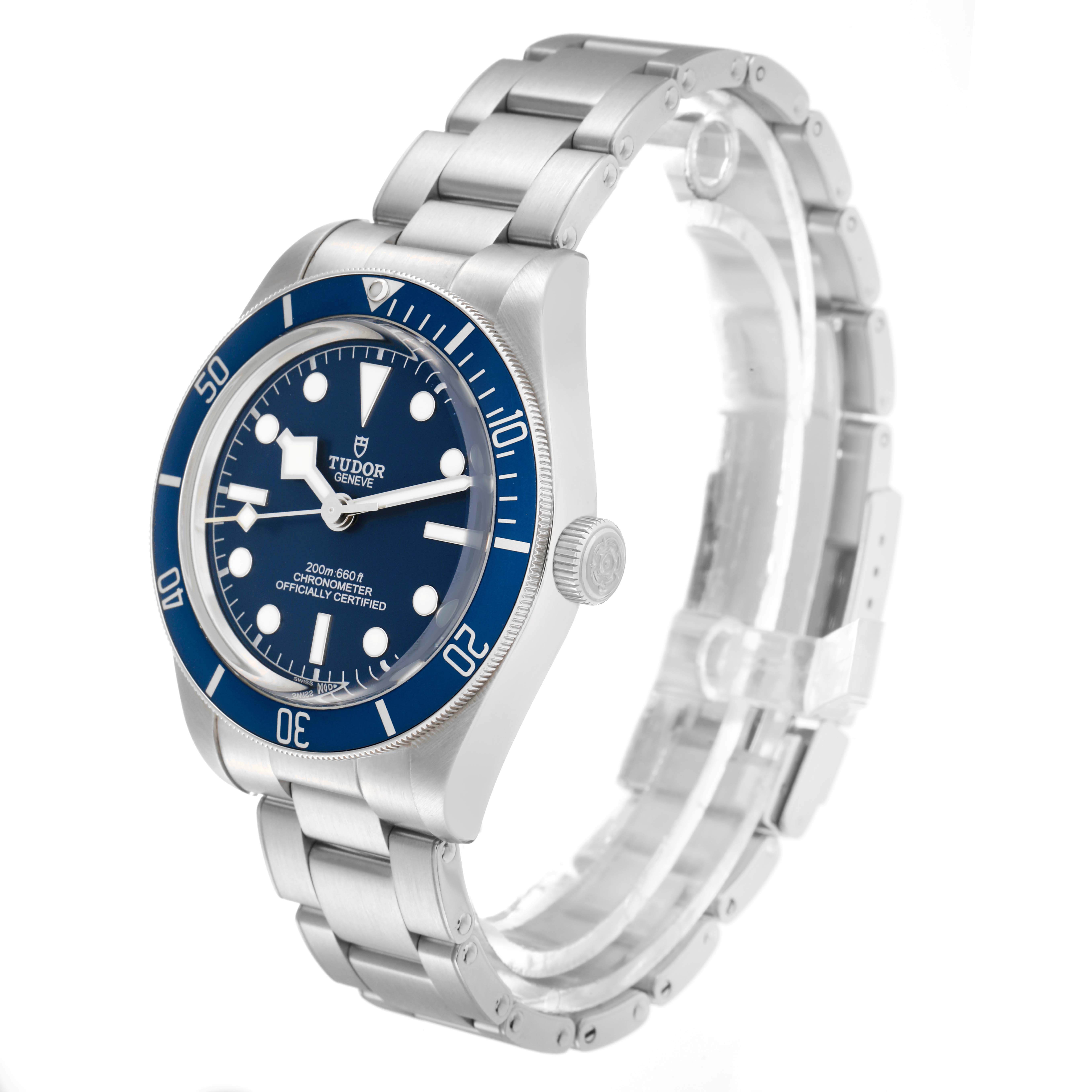 The Tudor Heritage Black Bay 79030B Men
s Stainless Steel Blue Dial watch is shown at a three-quarter angle, highlighting its face, bezel, crown, and bracelet.