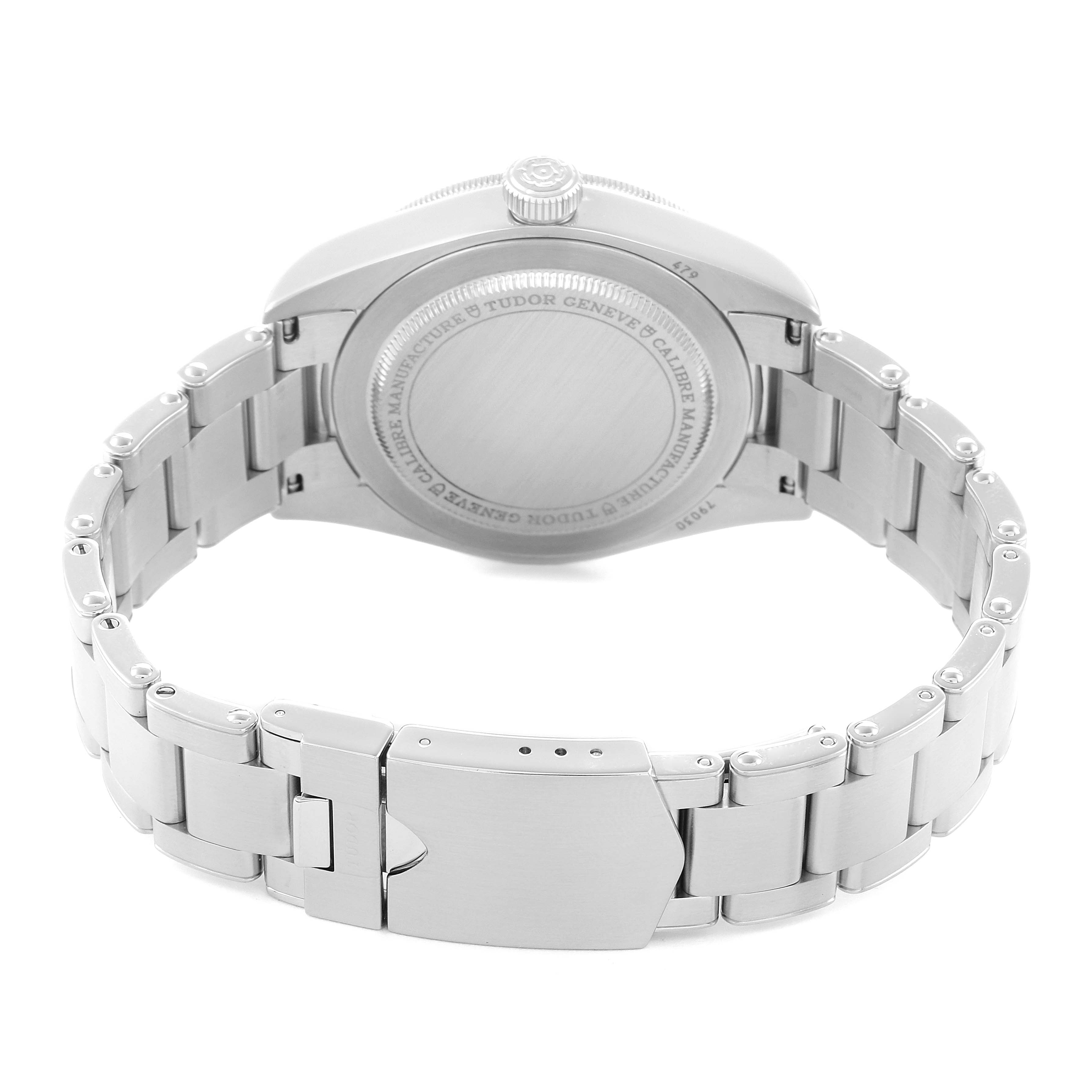 The image shows the back case and metal bracelet of a Tudor Heritage Black Bay 79030B Men
s Stainless Steel Blue Dial watch from behind.