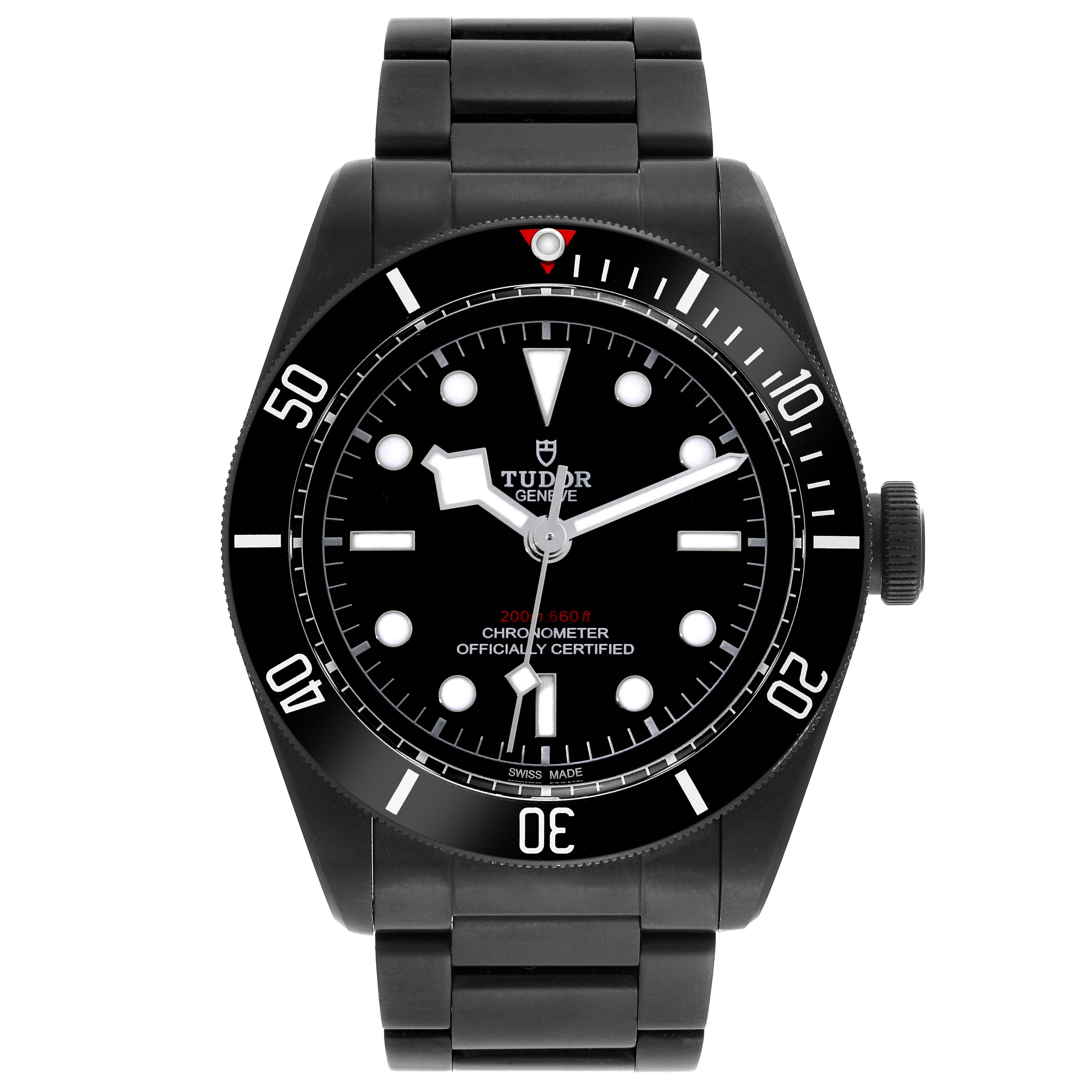 The Tudor Heritage Black Bay 79230DK Men's Stainless Steel Black Dial 79230DK Men's Stainless Steel Black Dial watch is shown from a front angle, highlighting the face, bezel, and bracelet.