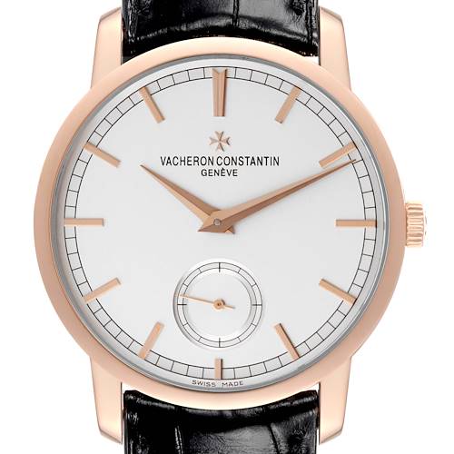 The Vacheron Constantin Traditionnelle watch is shown from a frontal angle, displaying its dial, hands, and part of its strap.