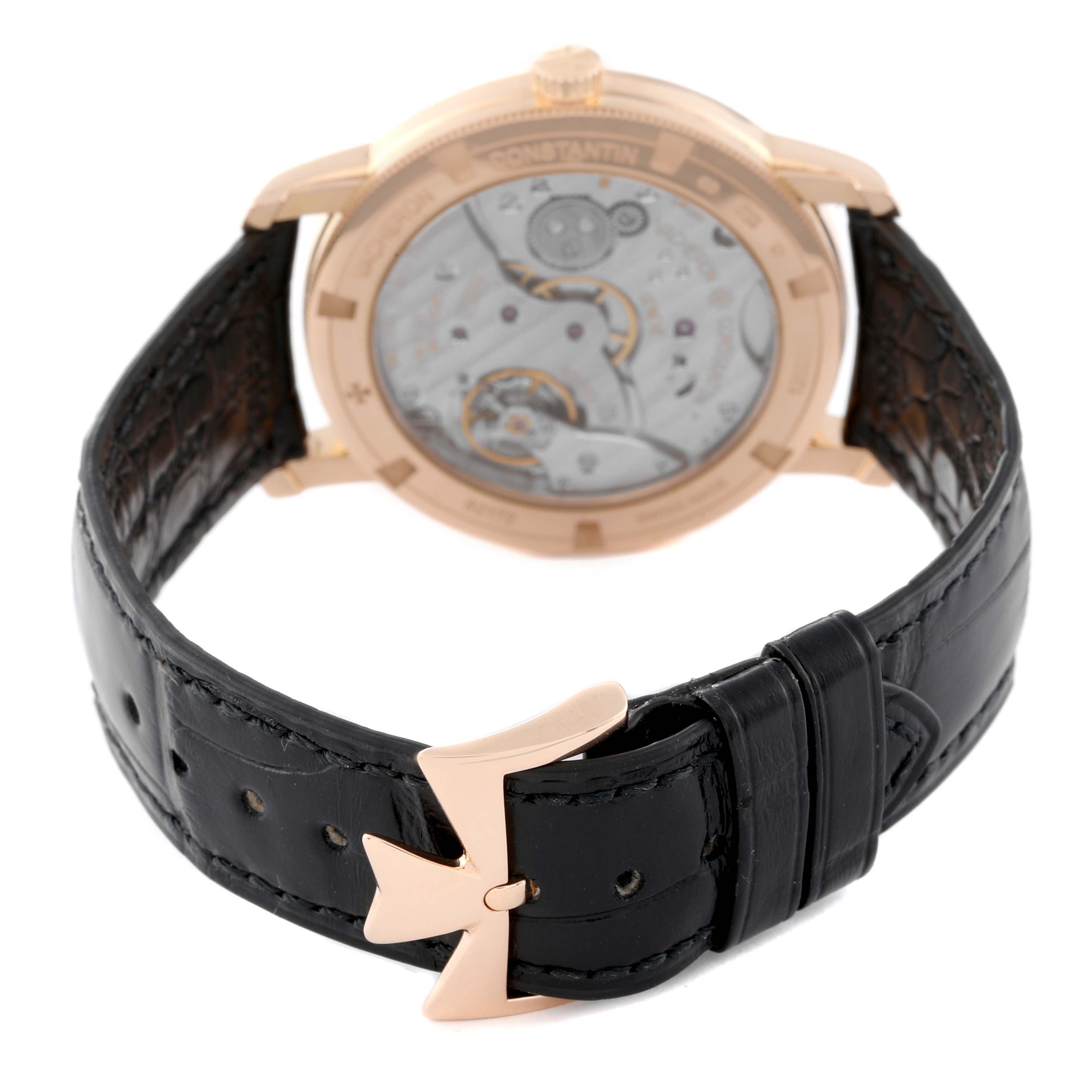 This image shows the back view of a Vacheron Constantin Traditionnelle 82172/000R-9412 Men's Rose Gold Silver Dial 82172/000R-9412 Men's Rose Gold Silver Dial watch, focusing on its movement and leather strap with a distinctive buckle.