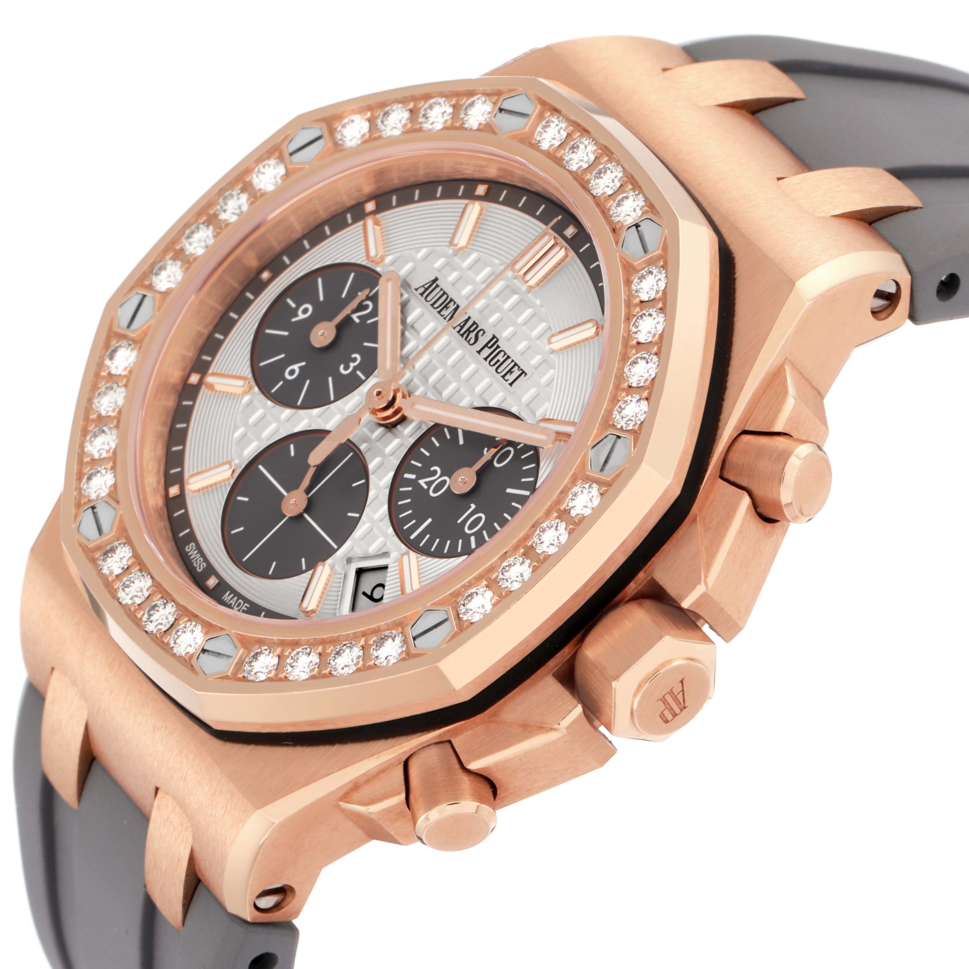 The Audemars Piguet Royal Oak Offshore 26231OR Men
s Rose Gold Silver Dial watch is shown at an angle highlighting the bezel with diamonds, chronograph dials, and side pushers.