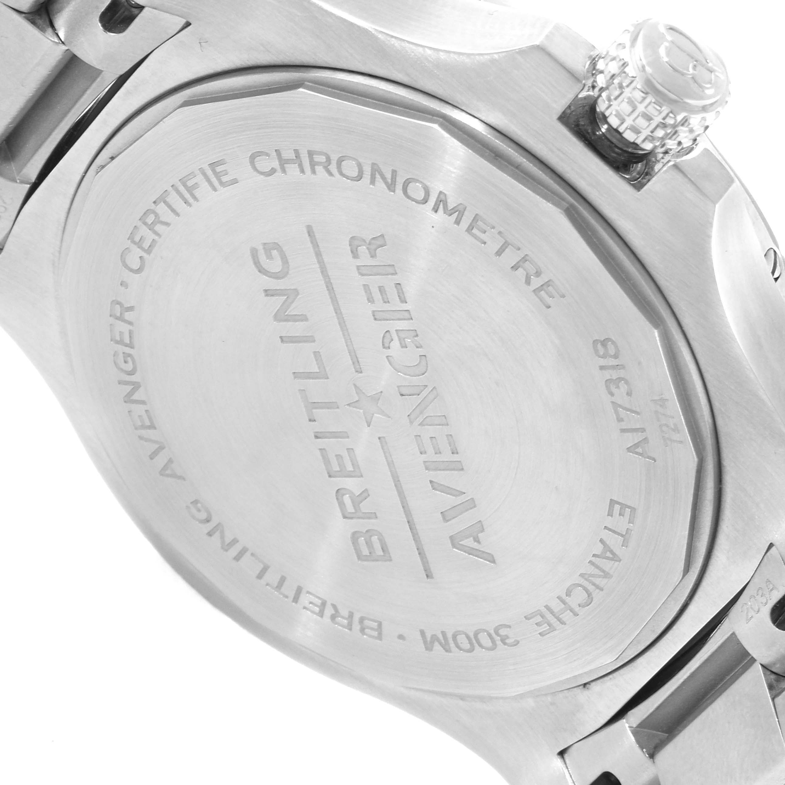 The image shows the back case and part of the crown of a Breitling Avenger A17318 Men's Stainless Steel Blue Dial A17318 Men's Stainless Steel Blue Dial watch.