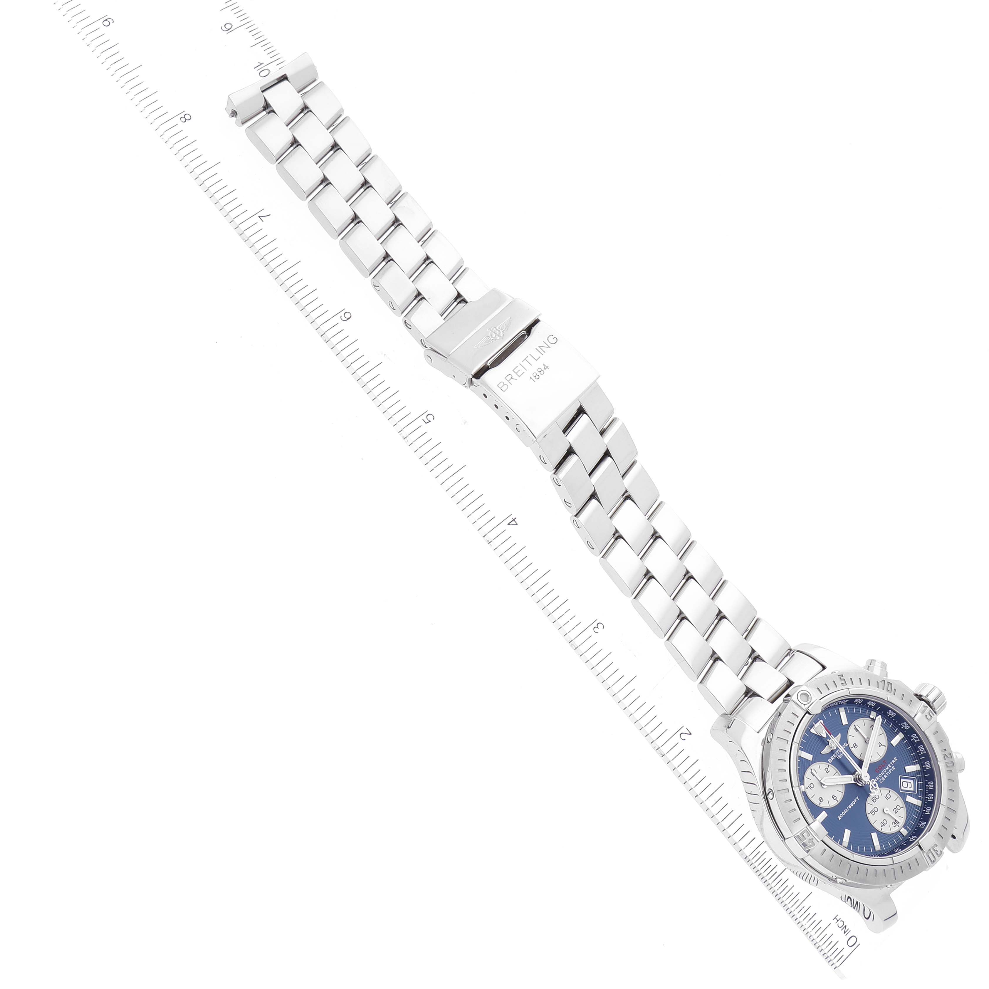 The image shows a flat-lay view of a Breitling Colt A73380 Men's Stainless Steel Blue Dial A73380 Men's Stainless Steel Blue Dial watch, displaying its blue dial and stainless steel bracelet with clasp.