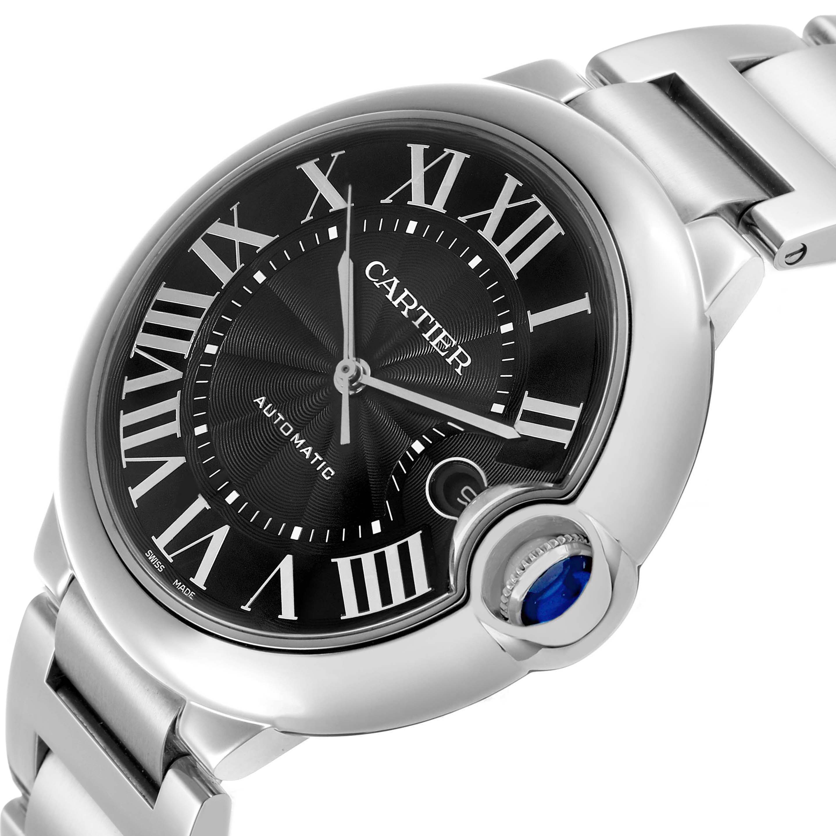 The Cartier Ballon Bleu W6920042 Mens Stainless Steel Black Dial watch is shown from a side angle, highlighting its face, crown, and metal bracelet.