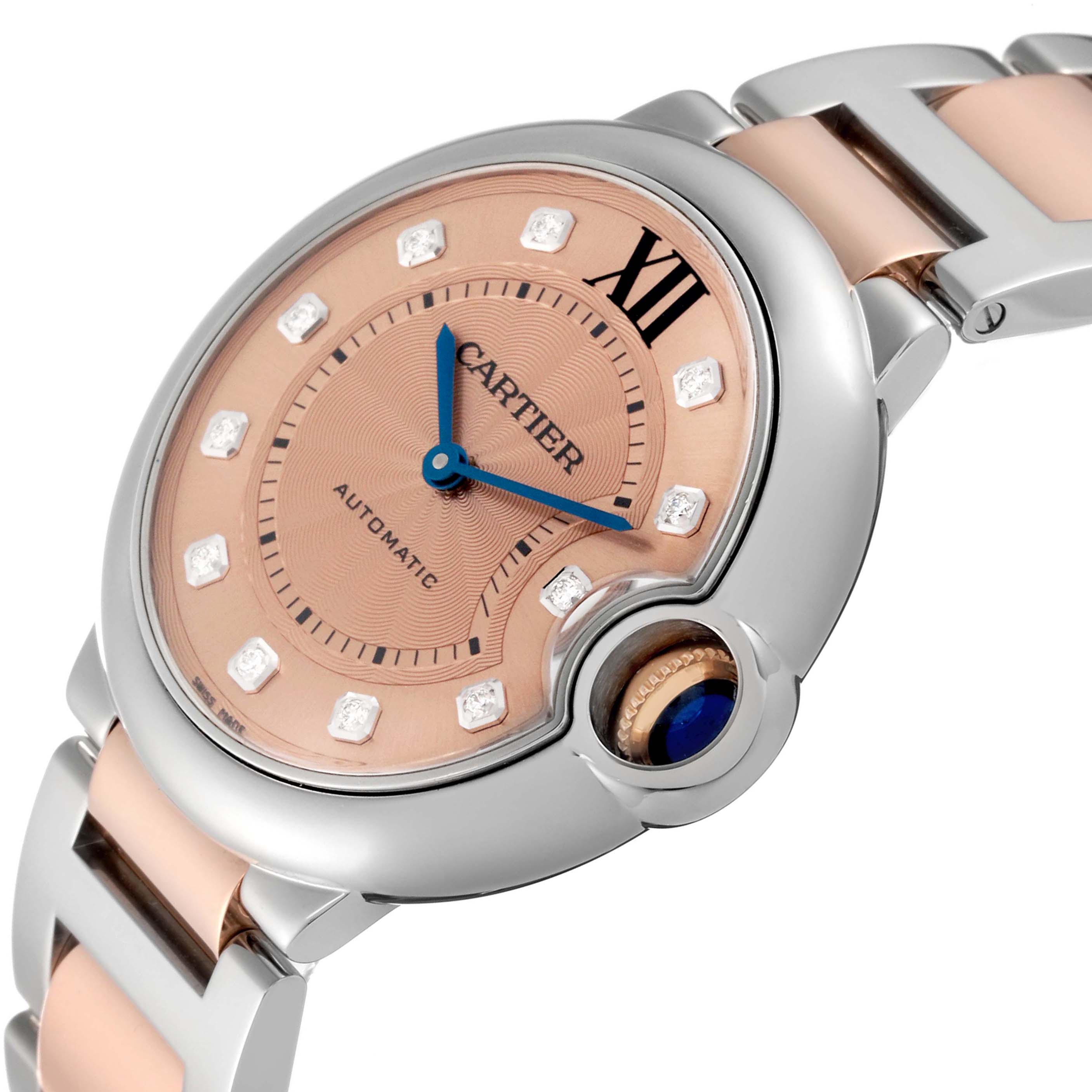 The image shows a close-up of the dial, bezel, and part of the bracelet of the Cartier Ballon Bleu WE902054 Women's Steel and Gold (two tone) Pink Dial WE902054 Women's Steel and Gold (two tone) Pink Dial model watch.