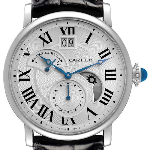 The Cartier Rotonde model W1556368 watch is shown from a front angle, displaying its silver dial, blue hands, Roman numerals, subdials, and a cabochon crown.