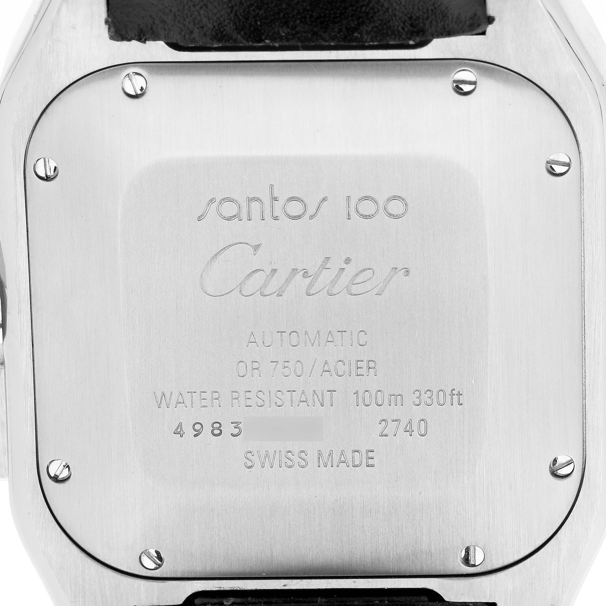 The image shows the back of a Santos model by Cartier, highlighting the engraving, screws, and part of the strap.