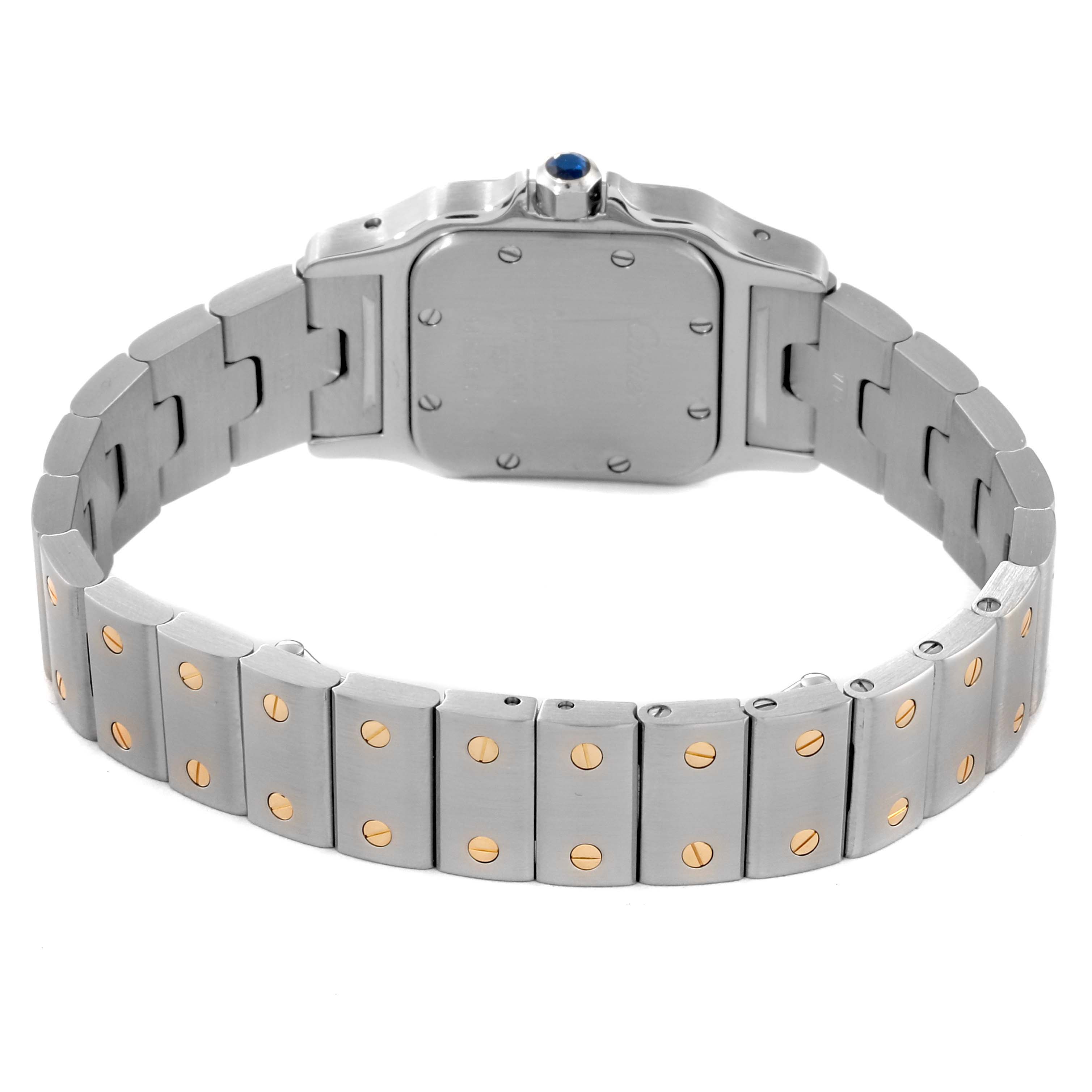 This image shows the back and bracelet of the Santos model watch by Cartier viewed from the rear angle.
