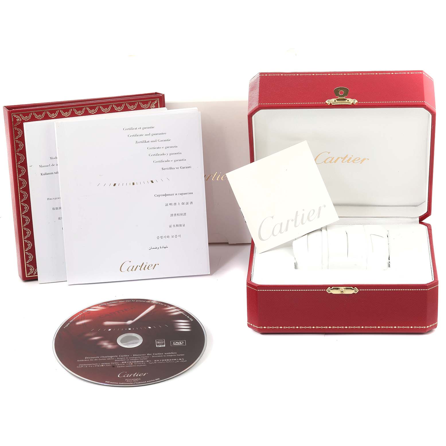 The image shows the packaging, documents, and a CD for a Cartier Tank Anglaise W5310007 Men's Steel and Gold (two tone) Silver Dial W5310007 Men's Steel and Gold (two tone) Silver Dial watch, including a red watch box and warranty booklets.